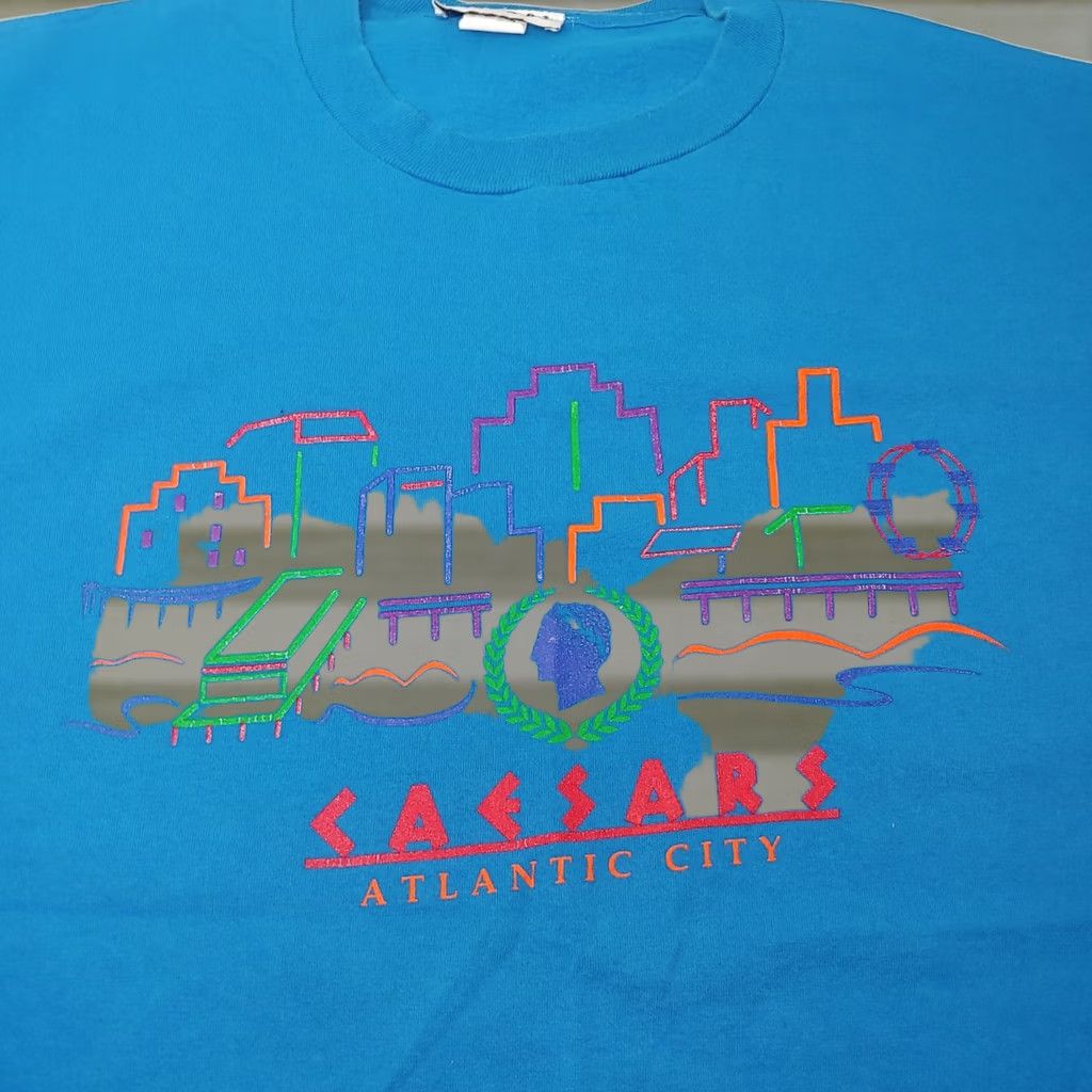 Vintage Caesars Atlantic City Casino Shirt Men XXL Turquoise Geometric 1990s Vintage Caesars Atlantic City Shirt Mens 2XL Geometric Casino T-Shirt Vintage 90s Size US XXL / EU 58 / 5 - 1 Thumbnail