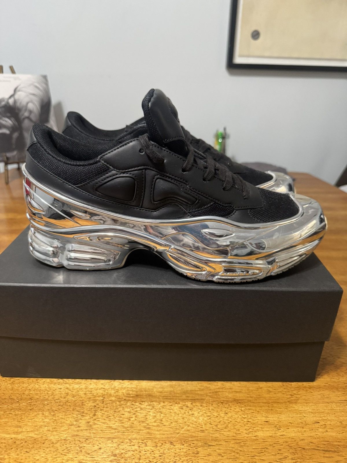 Raf Simons x Adidas Black and Silver Ozweego Sneakers