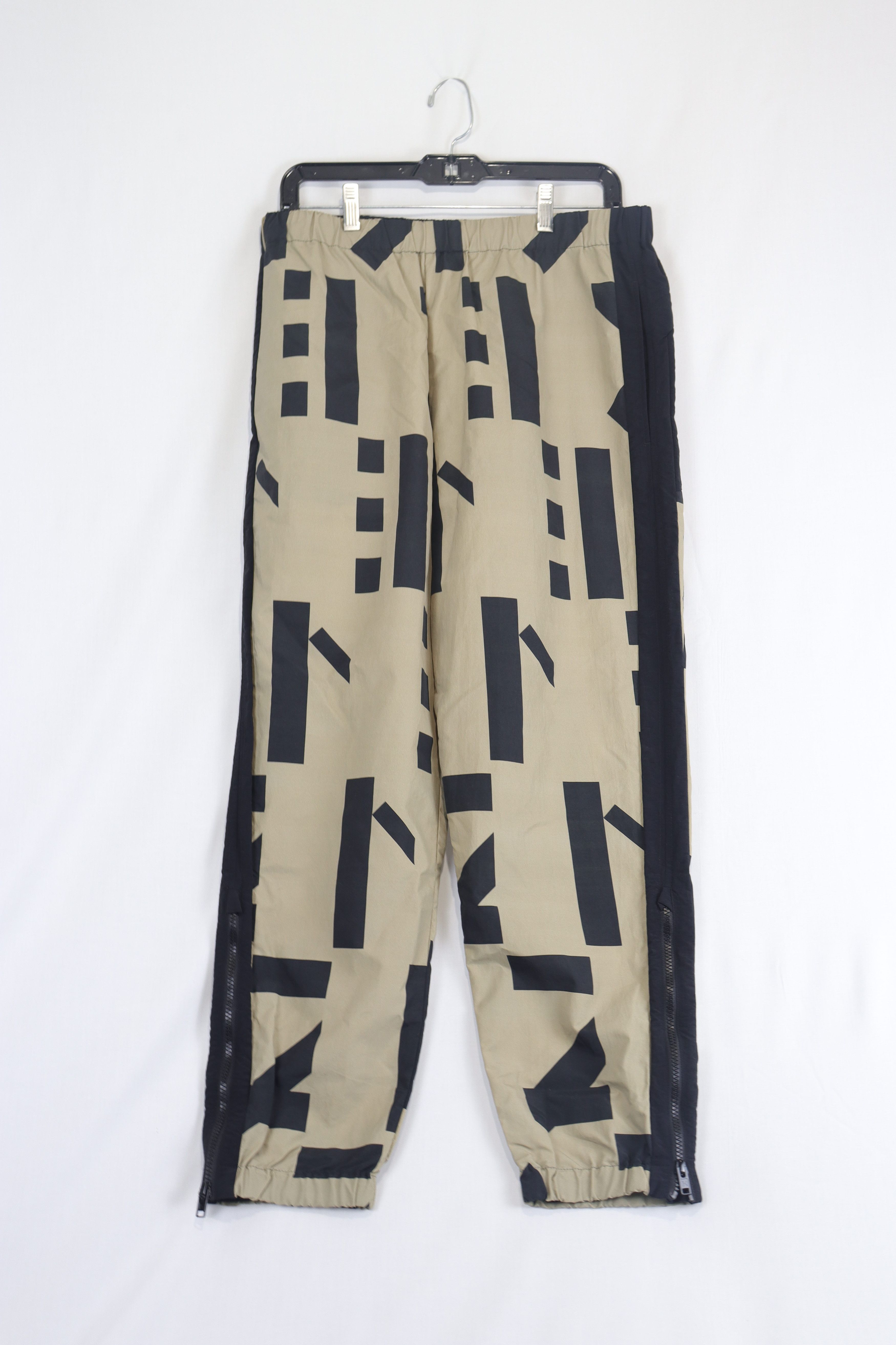 o1rshd11223 Monogram-Print Elasticated Trouser Light Brown