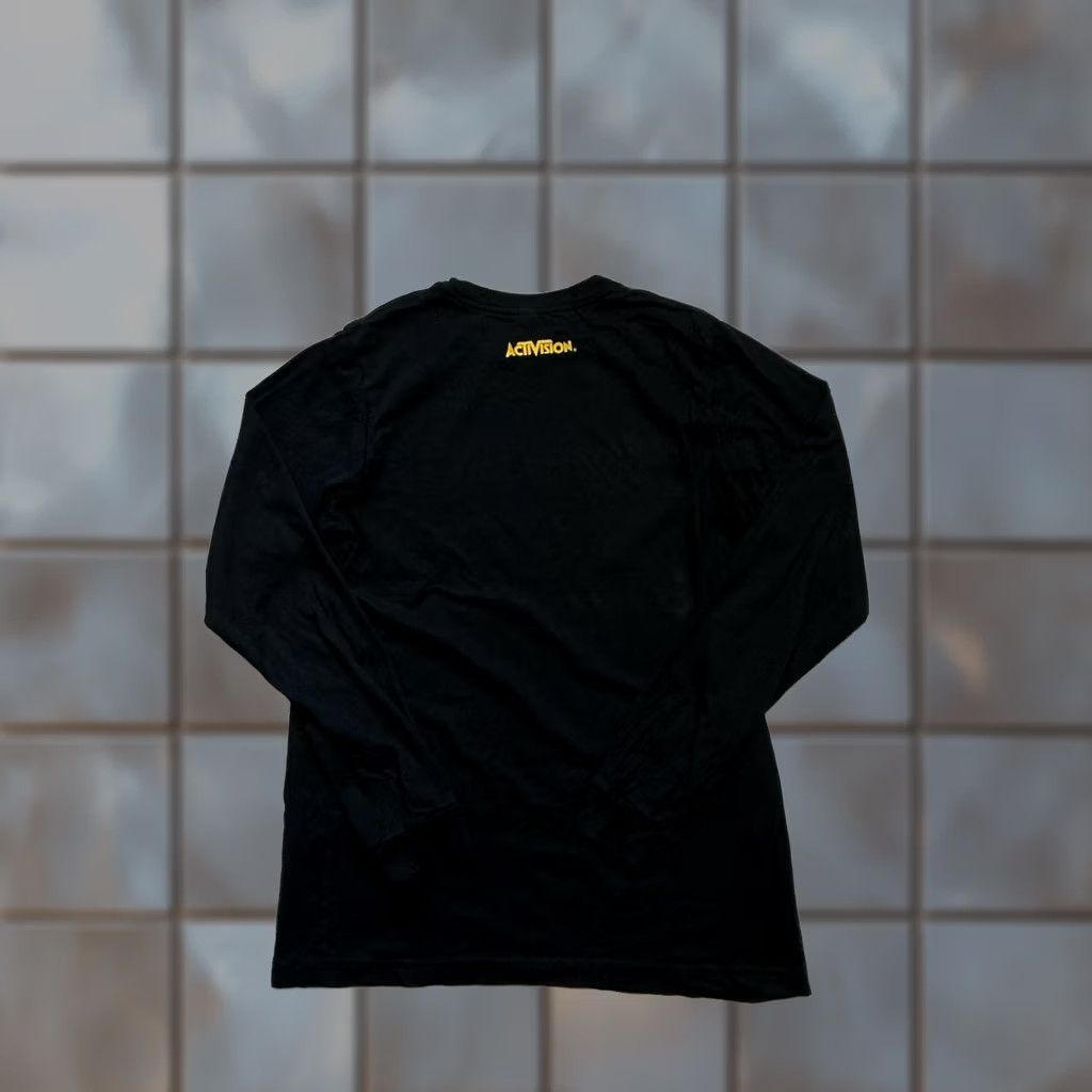 Vintage VINTAGE Activision All In Video Game Gaming Promo Black Graphic Long Sleeve T-Shirt Sz.L Mens Large Black Graphic T-Shirt Games Promo 90s Size US L / EU 52-54 / 3 - 1 Thumbnail
