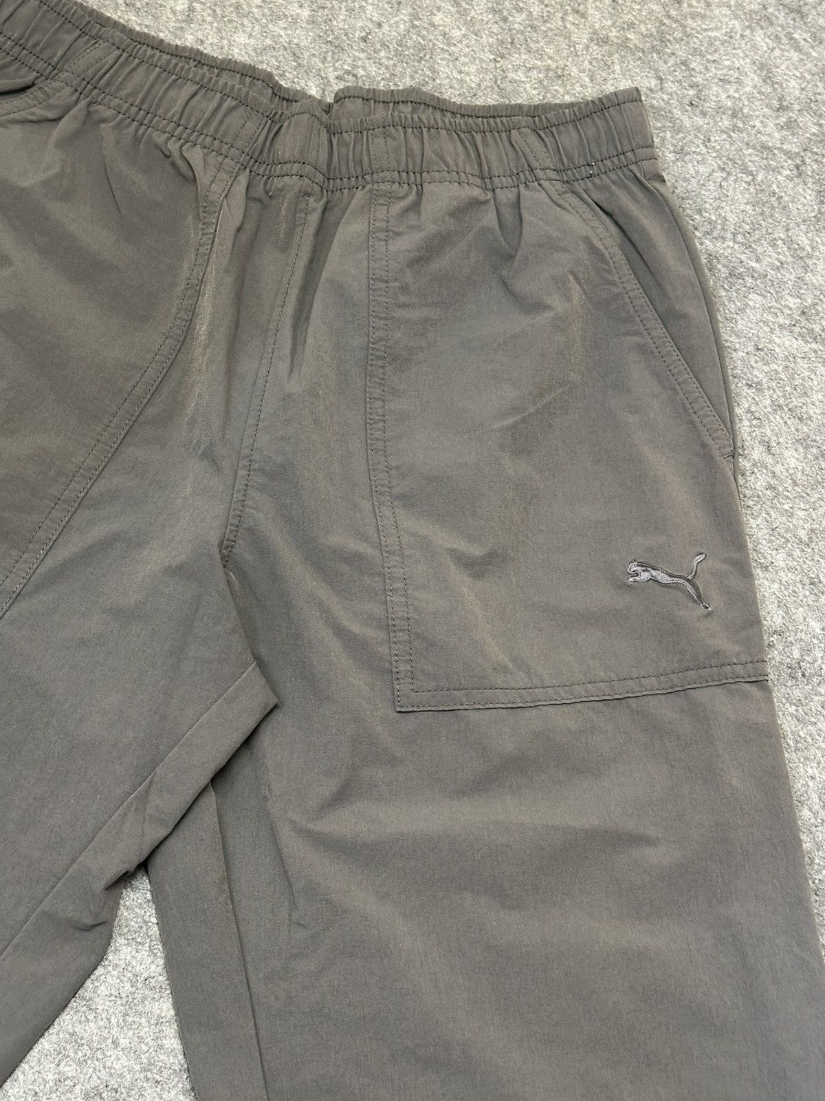 Puma PUMA dark grey track pants with a 3/4 length. Size US 30 / EU 46 - 6 Thumbnail