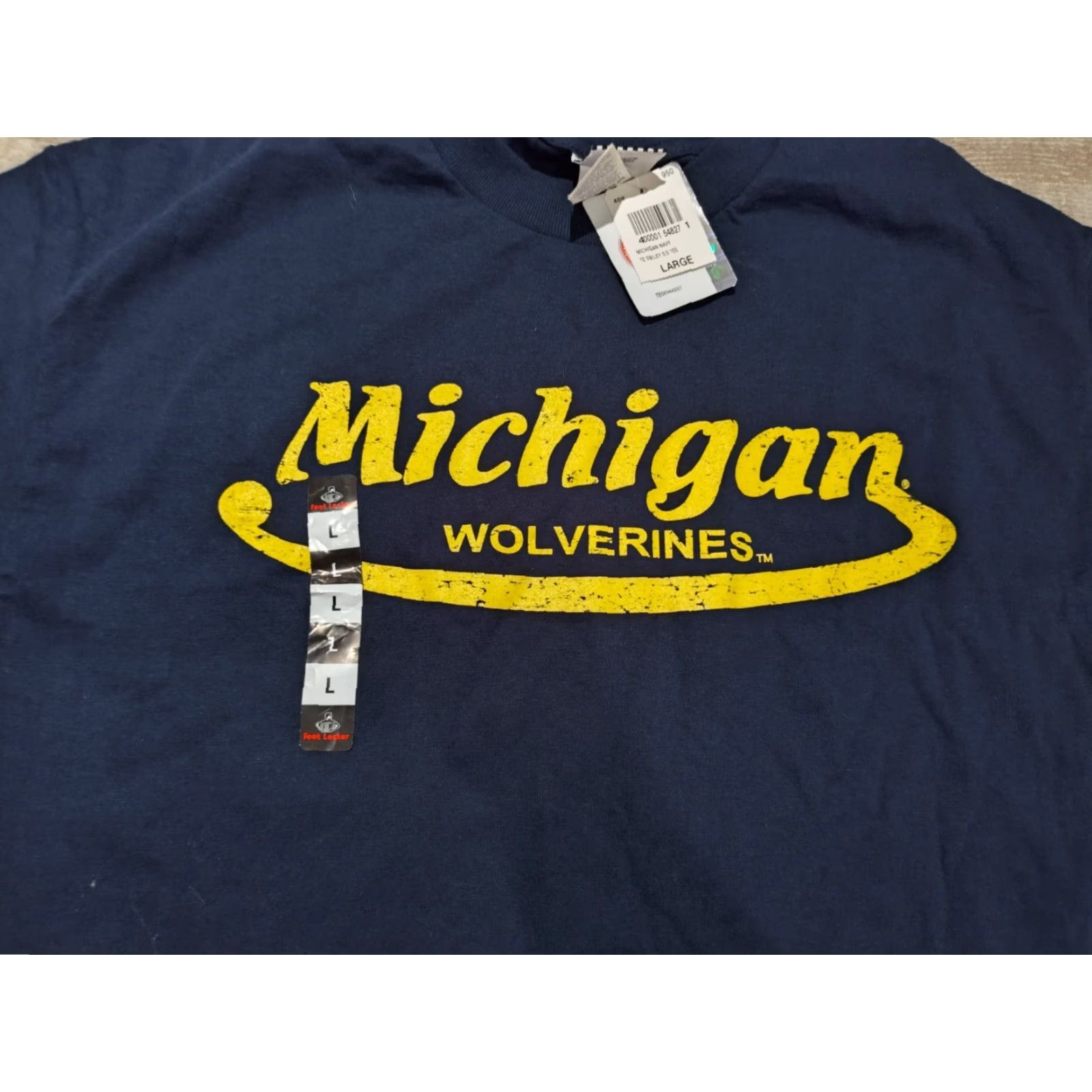 NCAA VINTAGE Foot Locker Michigan Wolverines T-Shirt Unisex Adults L Blue Crew Neck Short Sleeve Smiley NCAA Tee Shirt 90s Theme Mens Womens Size US L / EU 52-54 / 3 - 3 Thumbnail