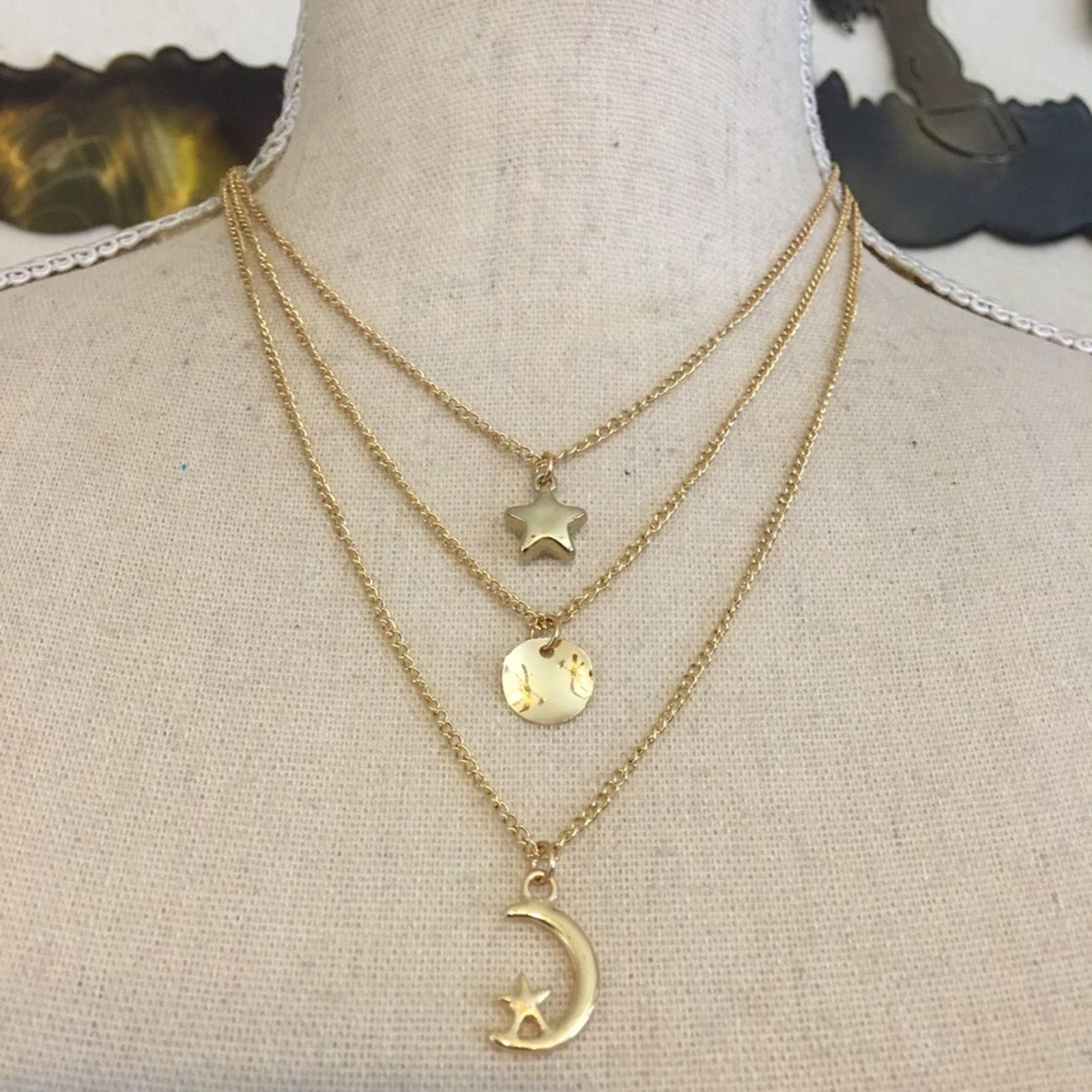 Jewelry Gold tone triple layered sun moon & stars necklace Size ONE SIZE - 1 Thumbnail