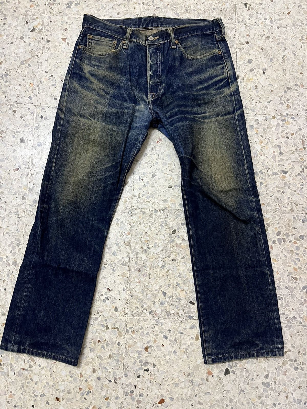 Distressed Levis 501 blue rusty denim