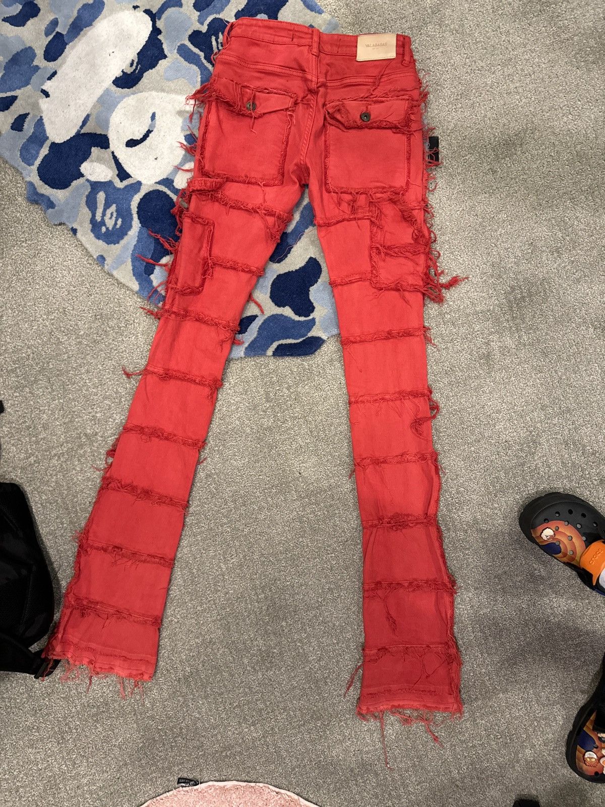 Red Stacked distressed joggers