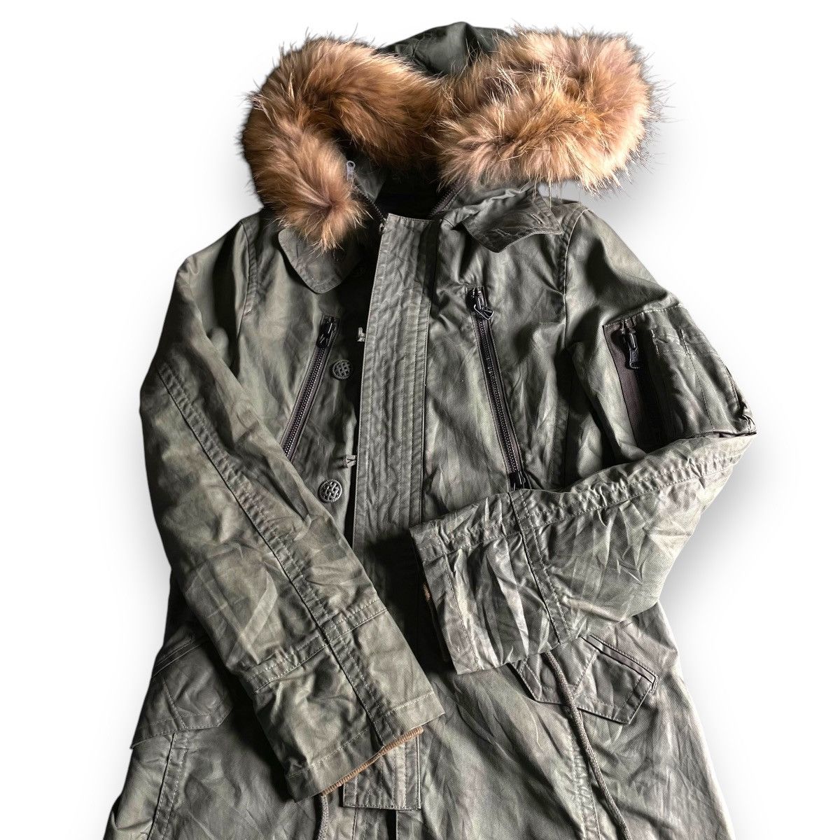 Genetic Manipulation Shinichiro Kuriya 🇯🇵 SHINICHIRO KARIYA WAXED FUR RACOON HOODIE PARKA JACKET Size US M / EU 48-50 / 2 - 3 Thumbnail