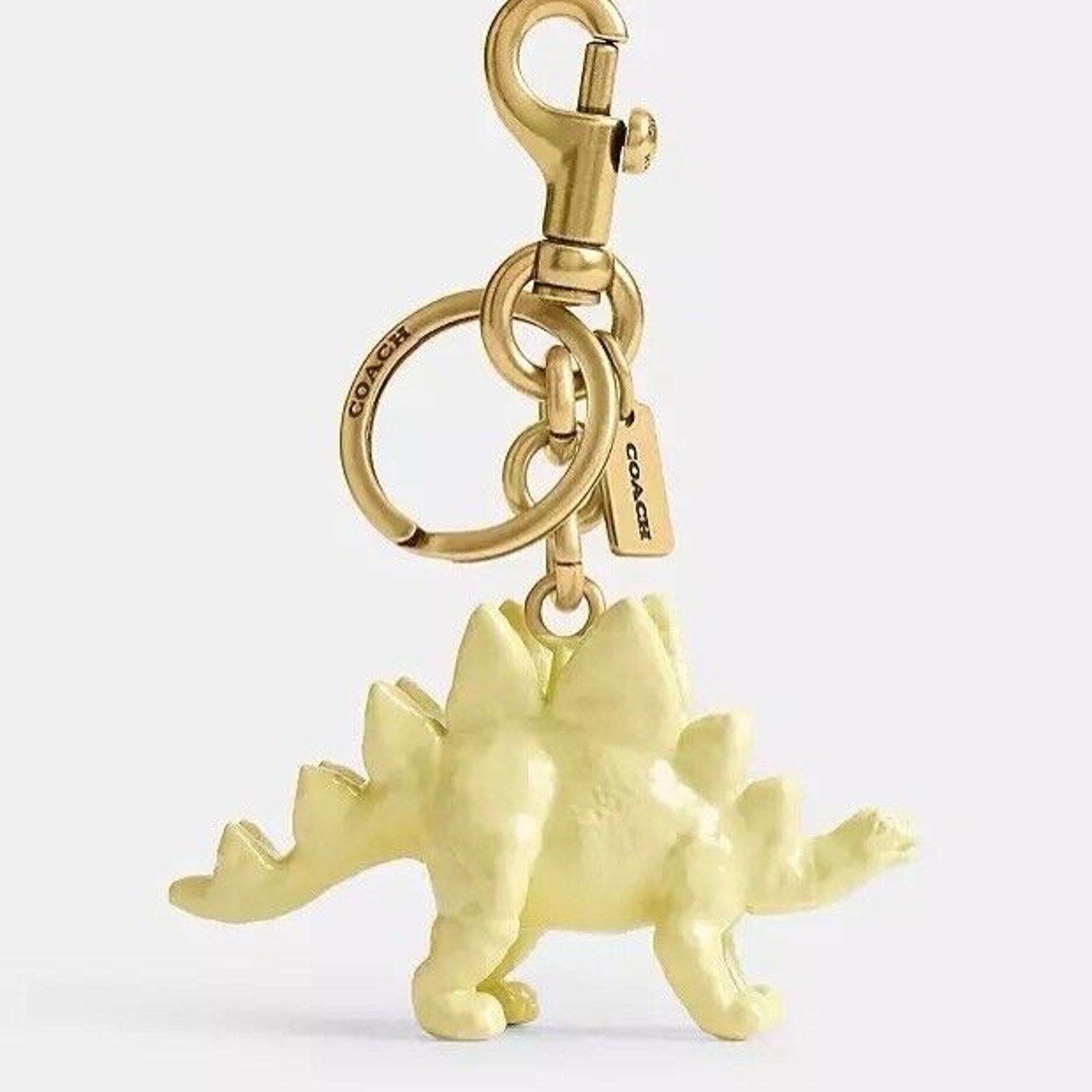 Coach NWT Coach CAX77 Keychain Stegosaurus Bag Charm Brass/Yellow Size ONE SIZE - 2 Thumbnail
