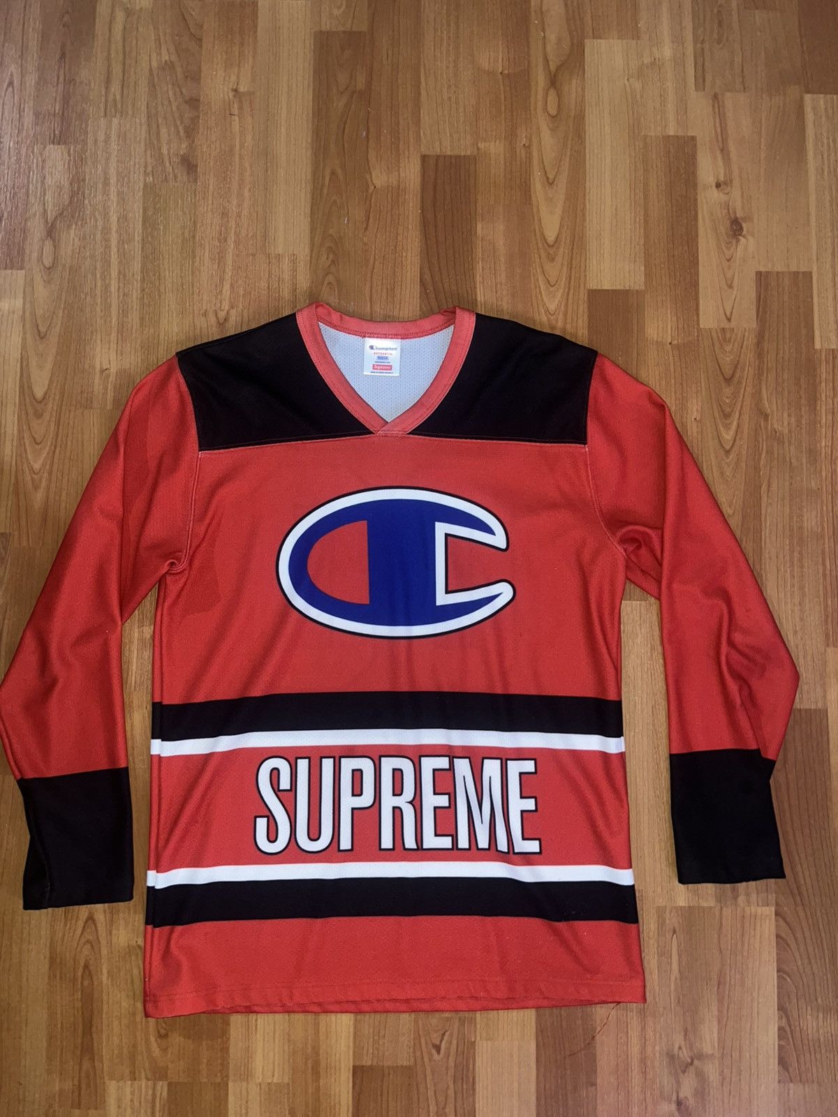 Champion × Supreme Red Supreme champion jersery Size medium Size US M / EU 48-50 / 2 - 1 Thumbnail