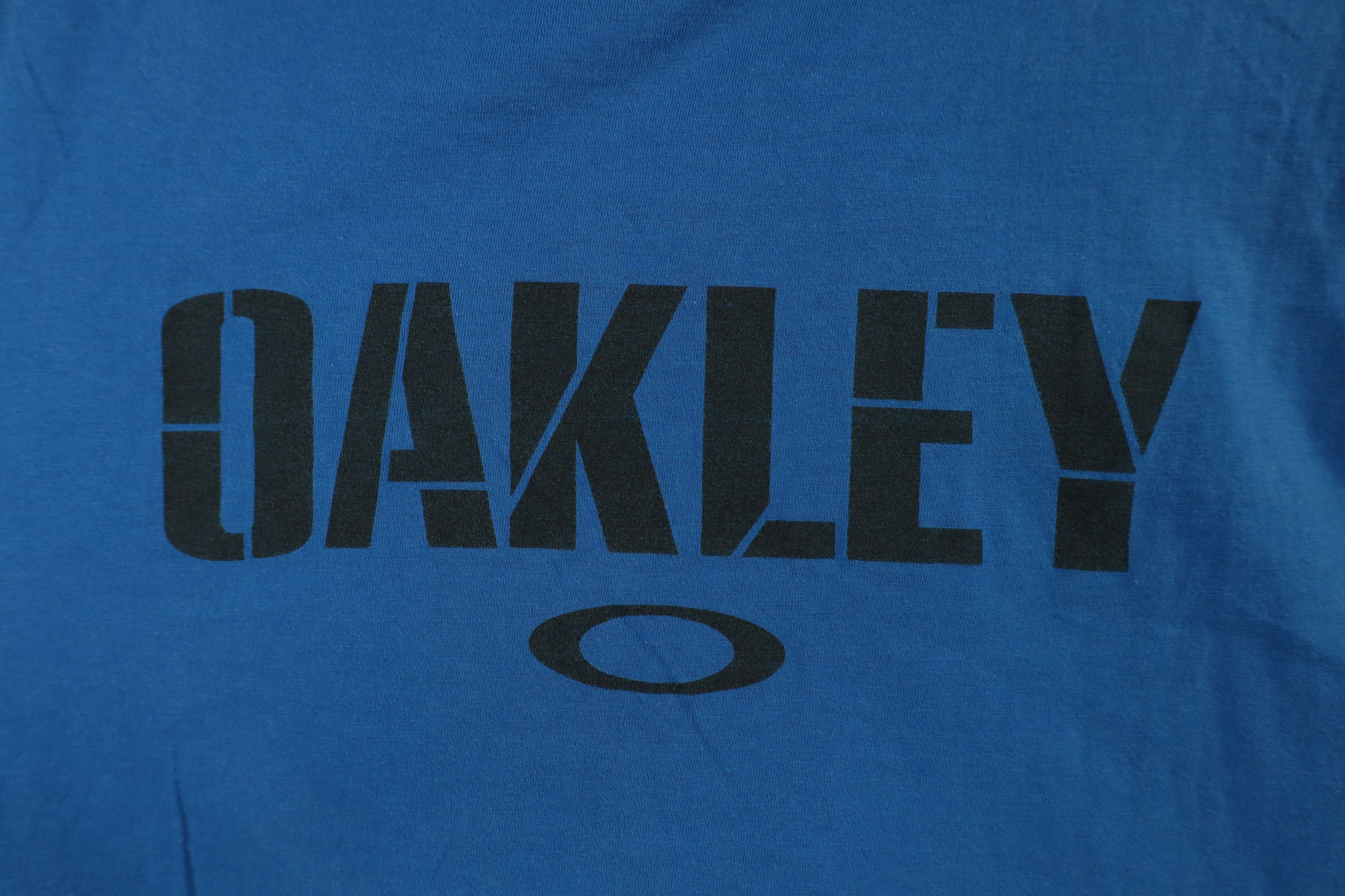 Oakley × Vintage Vintage Oakley Spell Out Stencil O Logo Short Sleeve T-Shirt Size US L / EU 52-54 / 3 - 4 Thumbnail