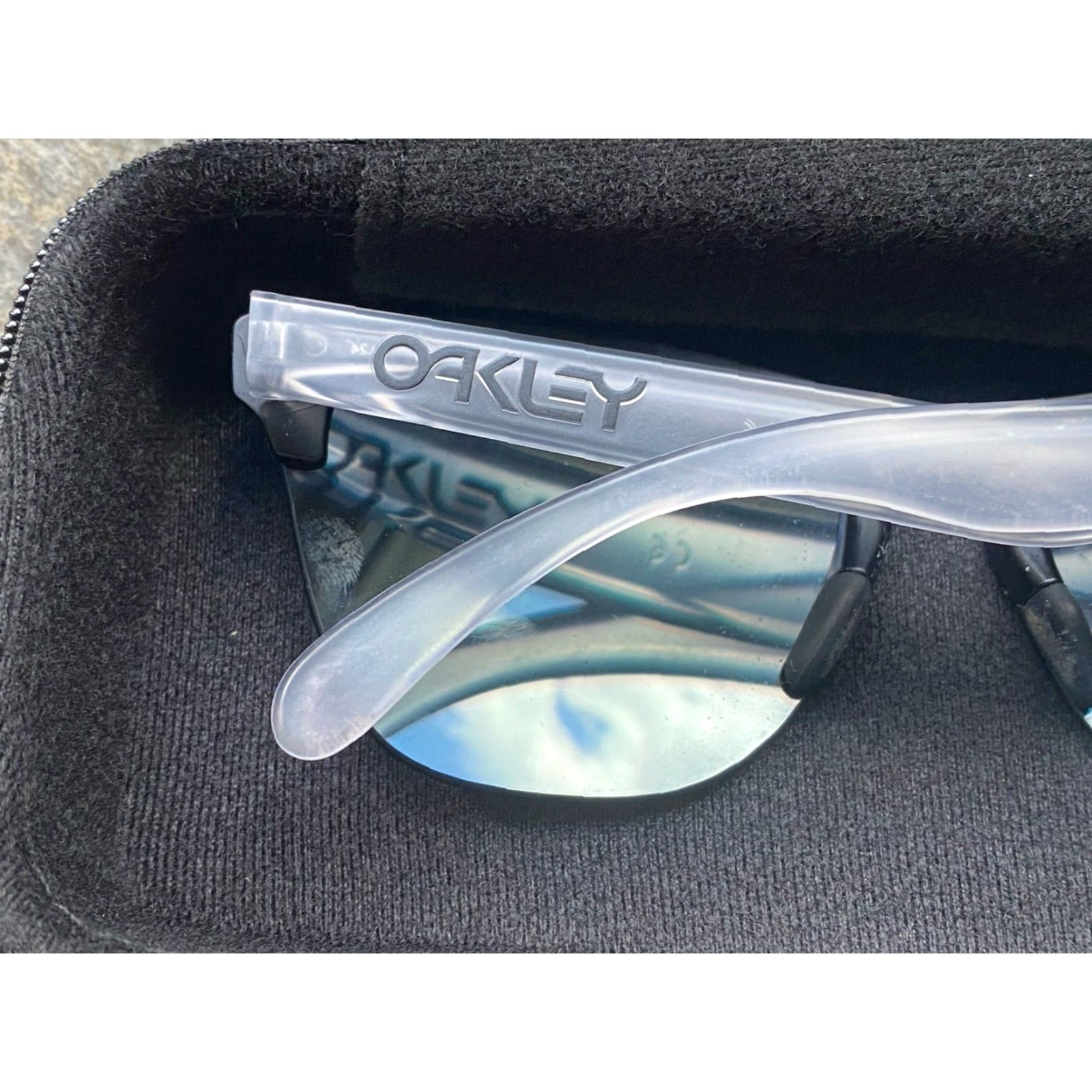 Oakley Oakley Frogskins Sunglasses Unisex Adults Clear/Black Frame Prizm Sapphire Blue Reflective Lenses Size ONE SIZE - 7 Thumbnail
