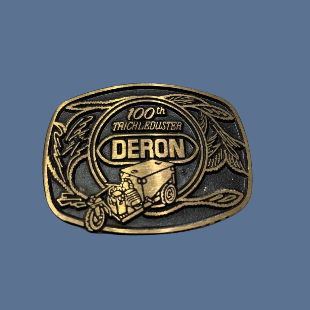 Vintage VINTAGE DynaBuckle Belt Buckle 1970s Deron 100th Trickleduster Solid Brass Black Enamel Inlays Men Size ONE SIZE - 1 Thumbnail