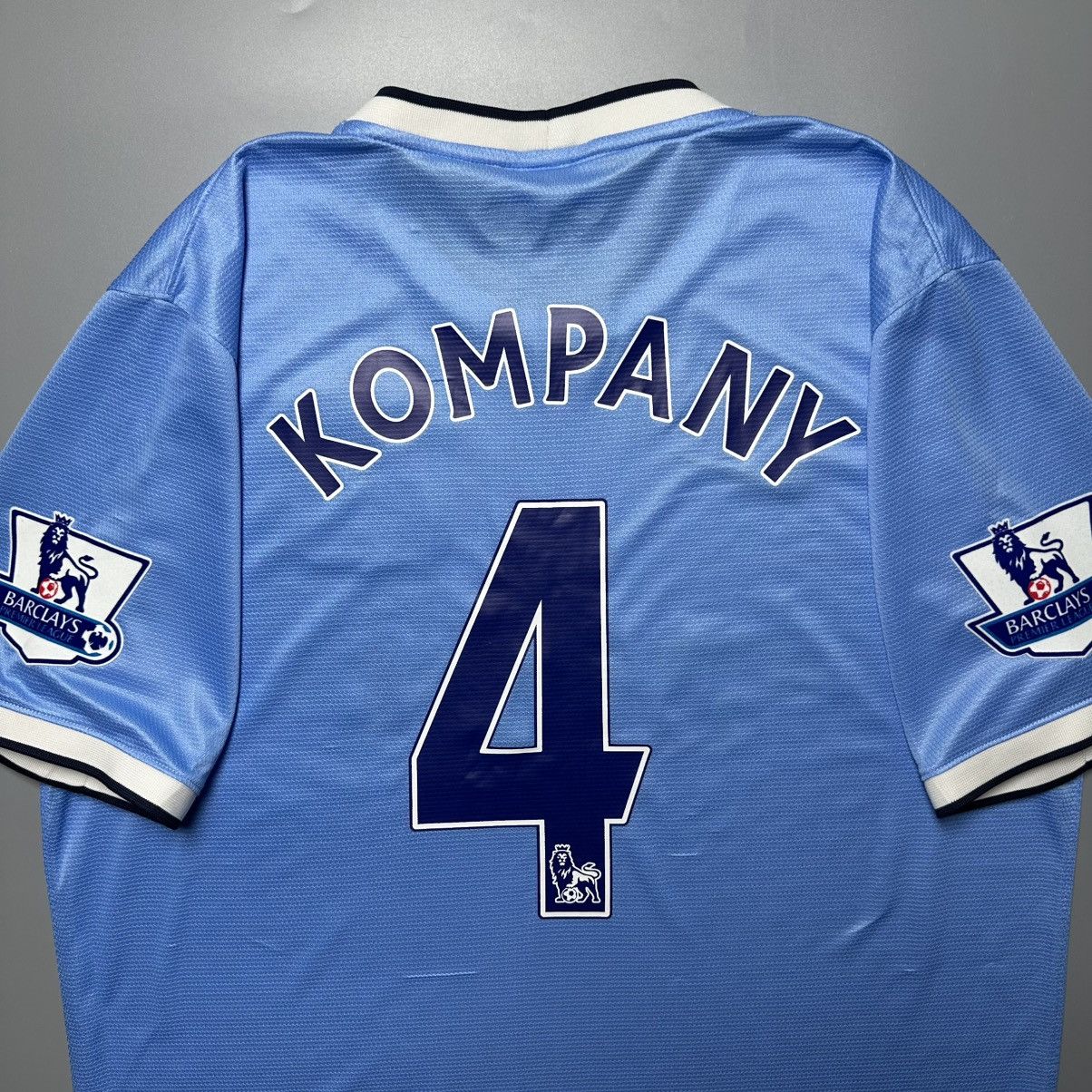 Nike MAN CITY NIKE 2013/2014 FOOTBALL HOME JERSEY #4 KOMPANY Size US XL / EU 56 / 4 - 11 Thumbnail