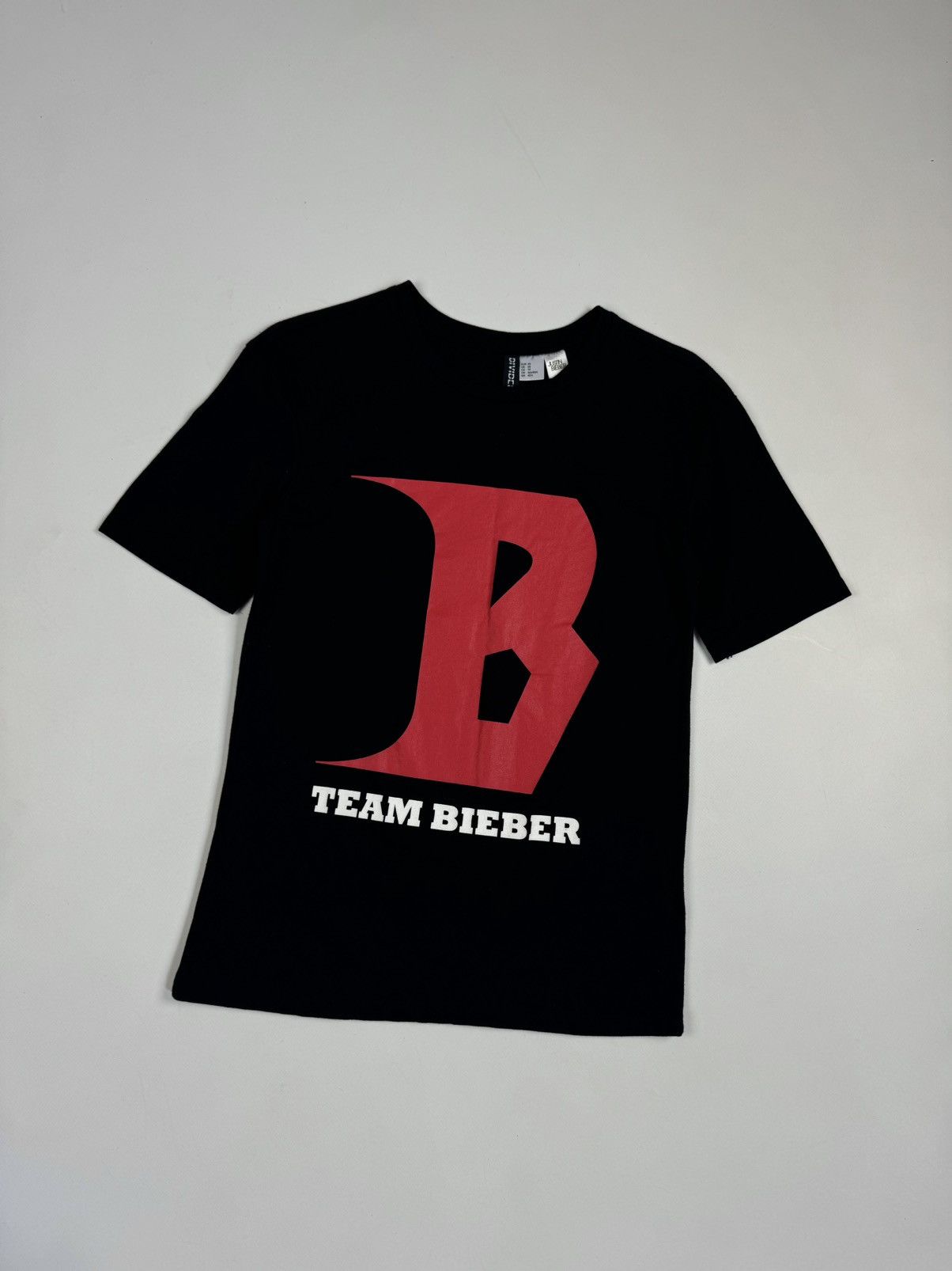 Divided × H&M × Justin Bieber Justin Bieber Team Divided by H&M Short Sleeve Black T-Shirt Size XS / US 0-2 / IT 36-38 - 1 Thumbnail