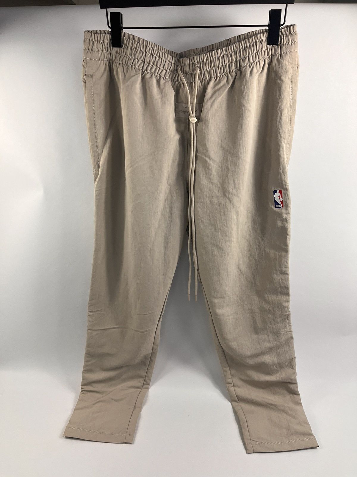 Nike fear of god track pants best sale