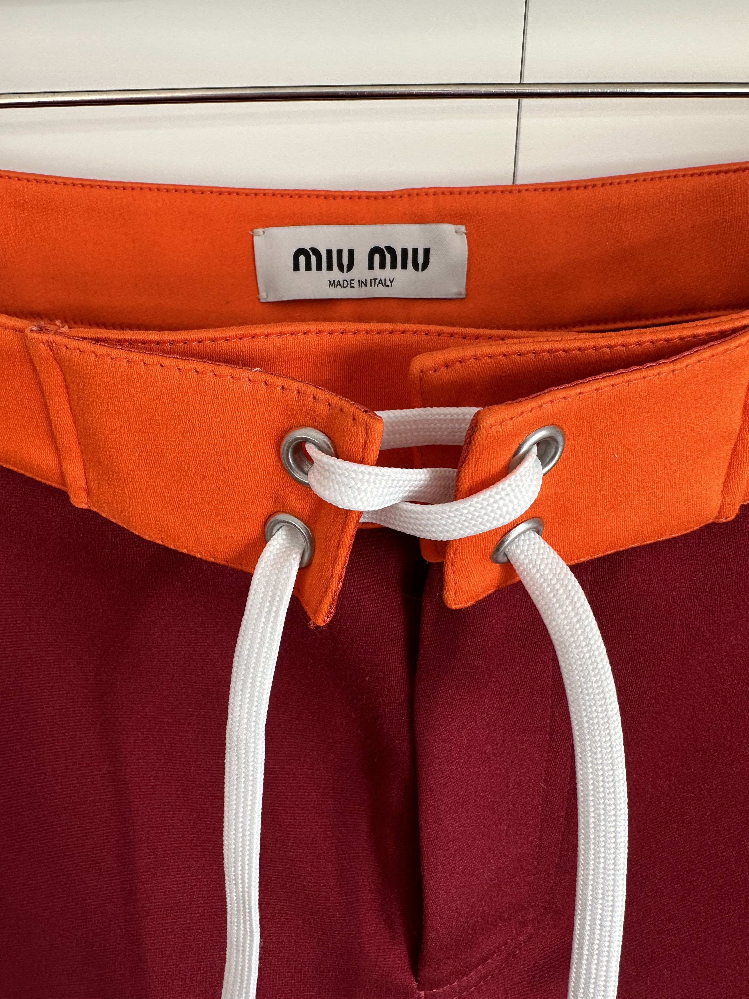Miu Miu From the SS24 runway contrasting-waistband shorts $ 1,820 Size 30" / US 8 / IT 44 - 8 Thumbnail