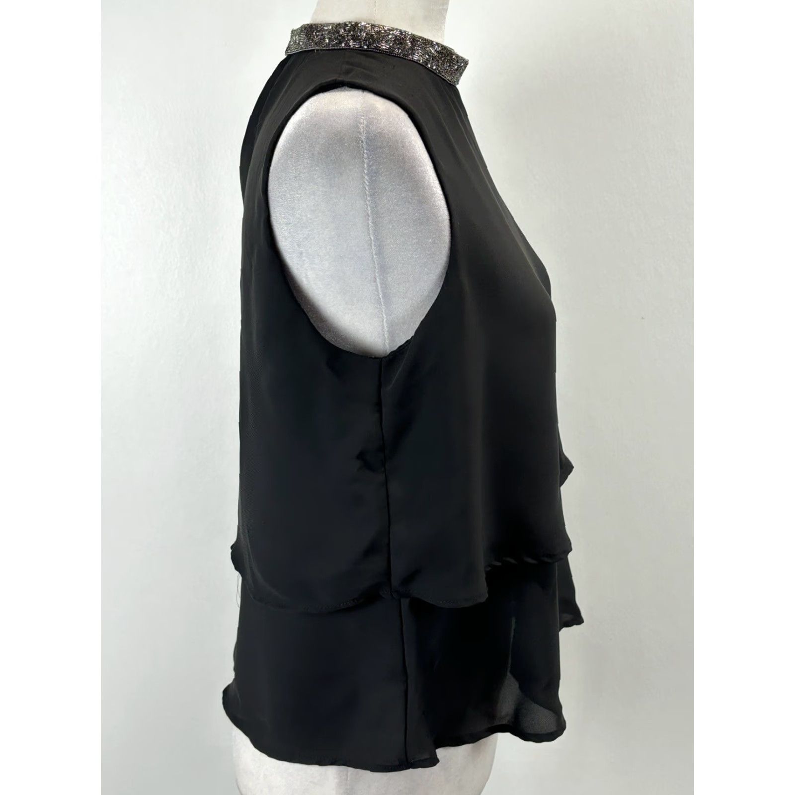 Zara VINTAGE? No. But we have Zara Basic Black Sleeveless Tiered Blouse with Silver Collar, Women, Size Small, Black, Sleeveless, Collared, Blouse. Size S / US 4 / IT 40 - 4 Thumbnail