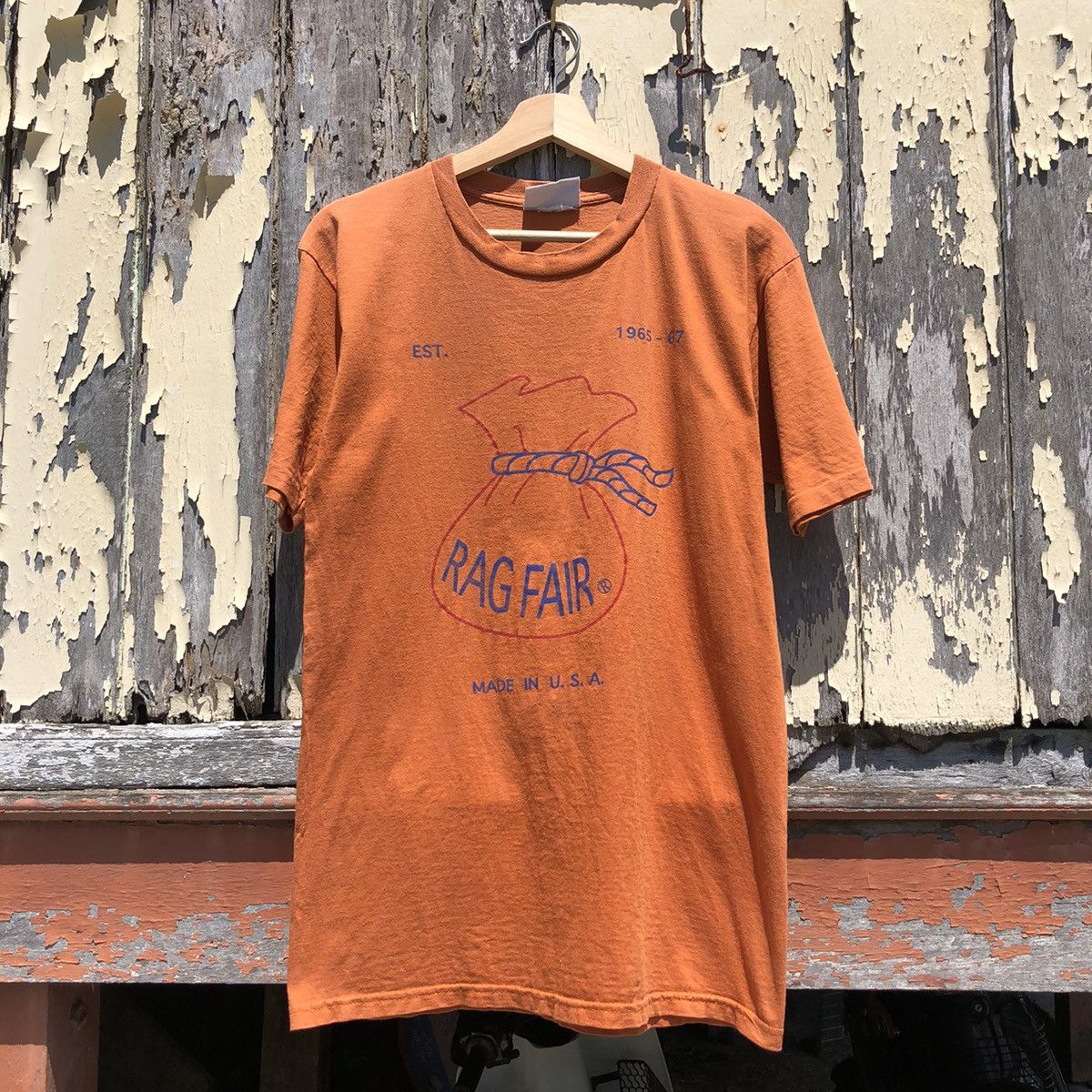image of Sunfaded Vintage 90's Rag Fair Made In Usa Tshirt in Orange, Men's (Size Medium)