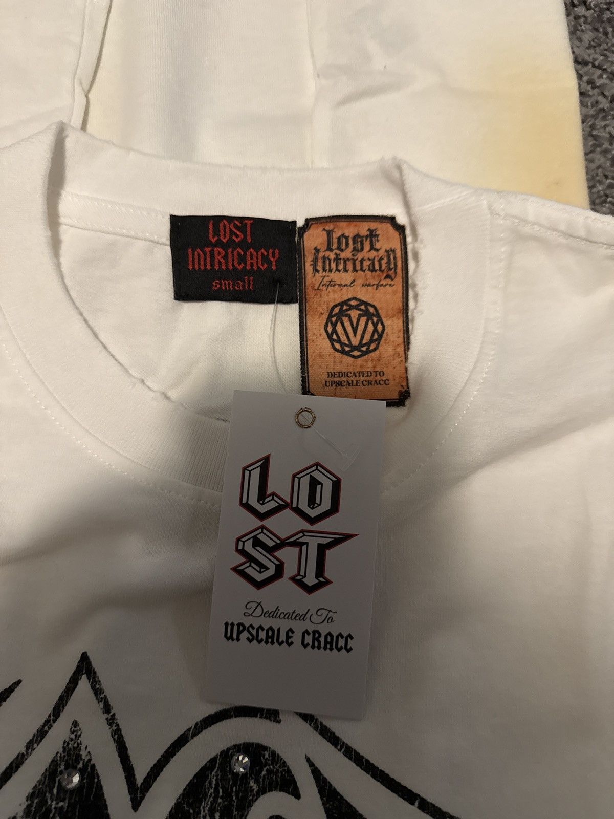 LOST INTRICACY Lost Intricacy - size small - for a steal! Size US S / EU 44-46 / 1 - 3 Thumbnail