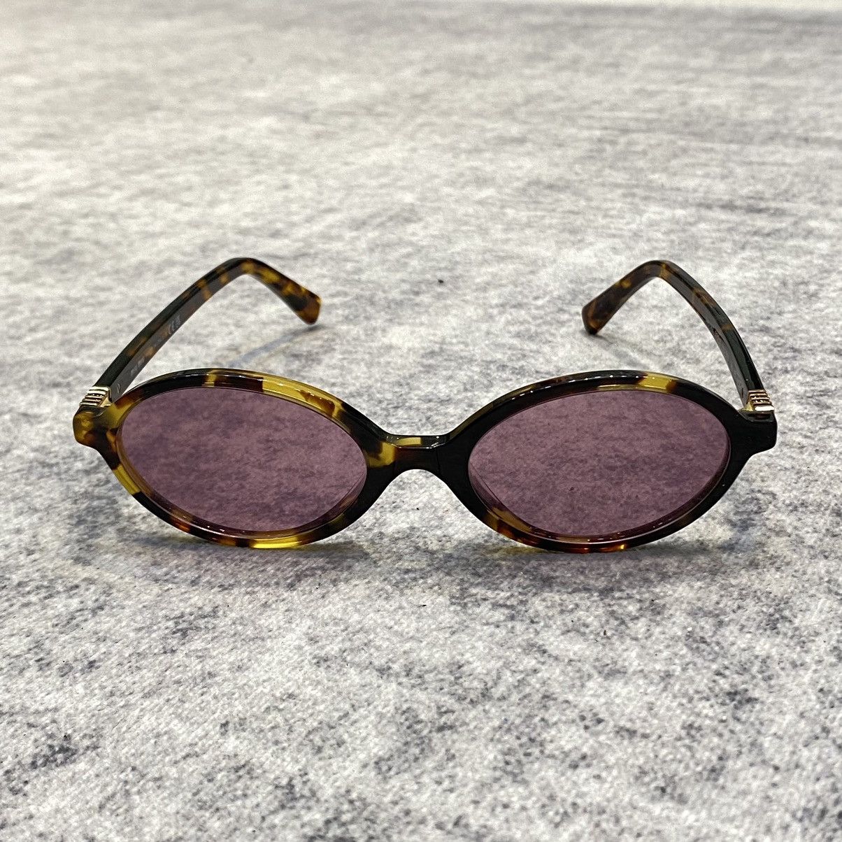 Miu Miu MIU MIU MU 04ZS VAU50D Eyewear HONEY Size ONE SIZE - 2 Thumbnail