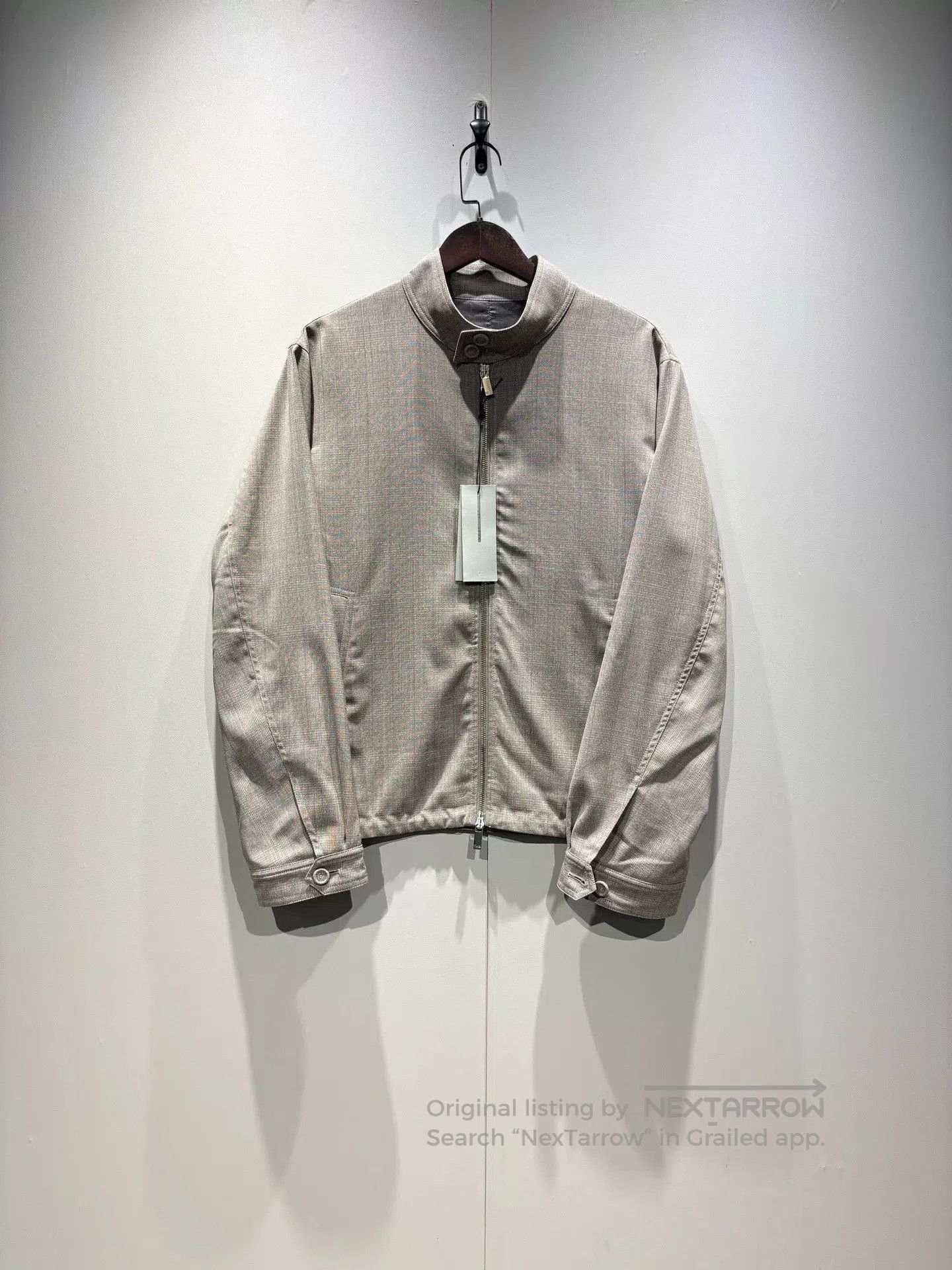 gray plaid wool jacket with CD logo.