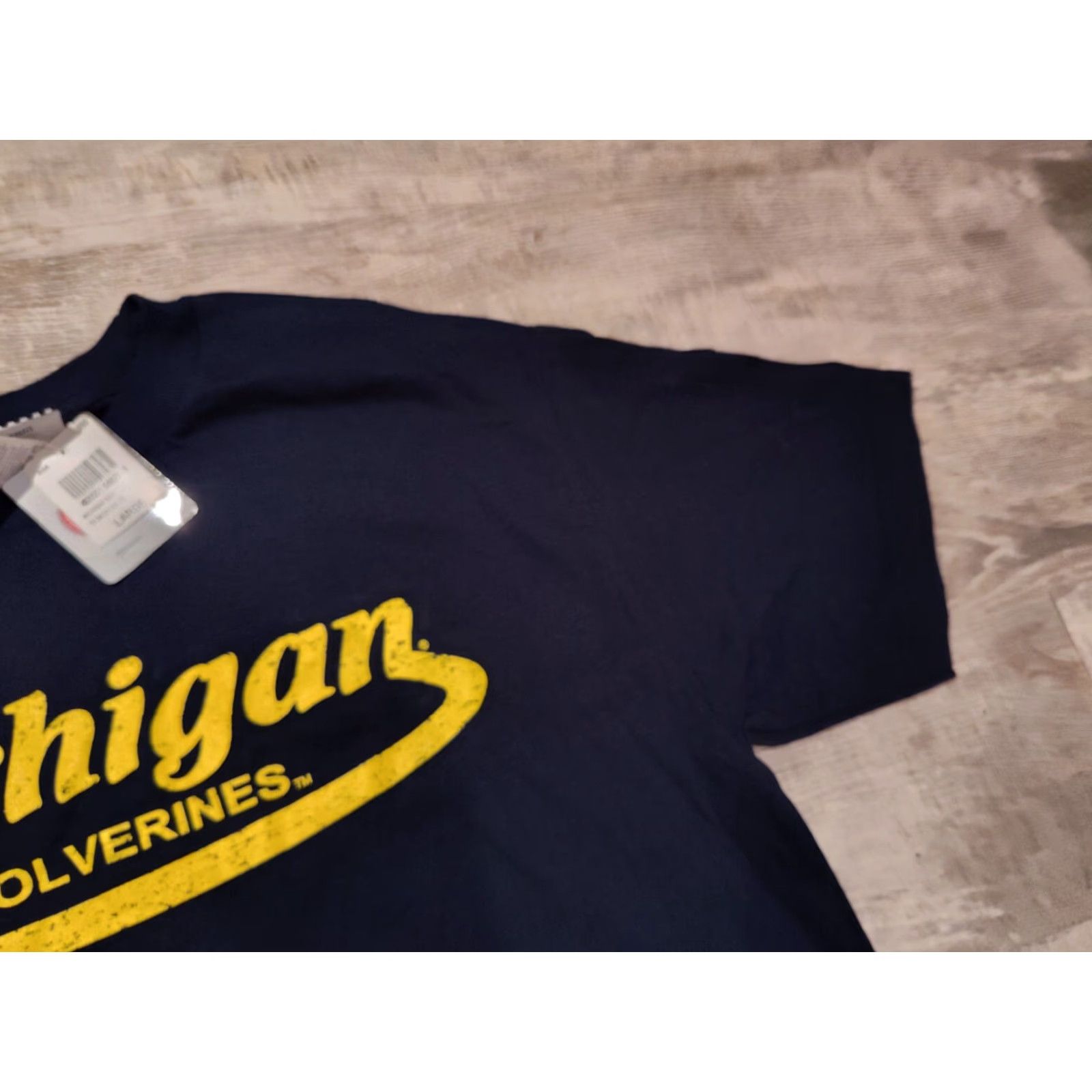 NCAA VINTAGE Foot Locker Michigan Wolverines T-Shirt Unisex Adults L Blue Crew Neck Short Sleeve Smiley NCAA Tee Shirt 90s Theme Mens Womens Size US L / EU 52-54 / 3 - 5 Thumbnail