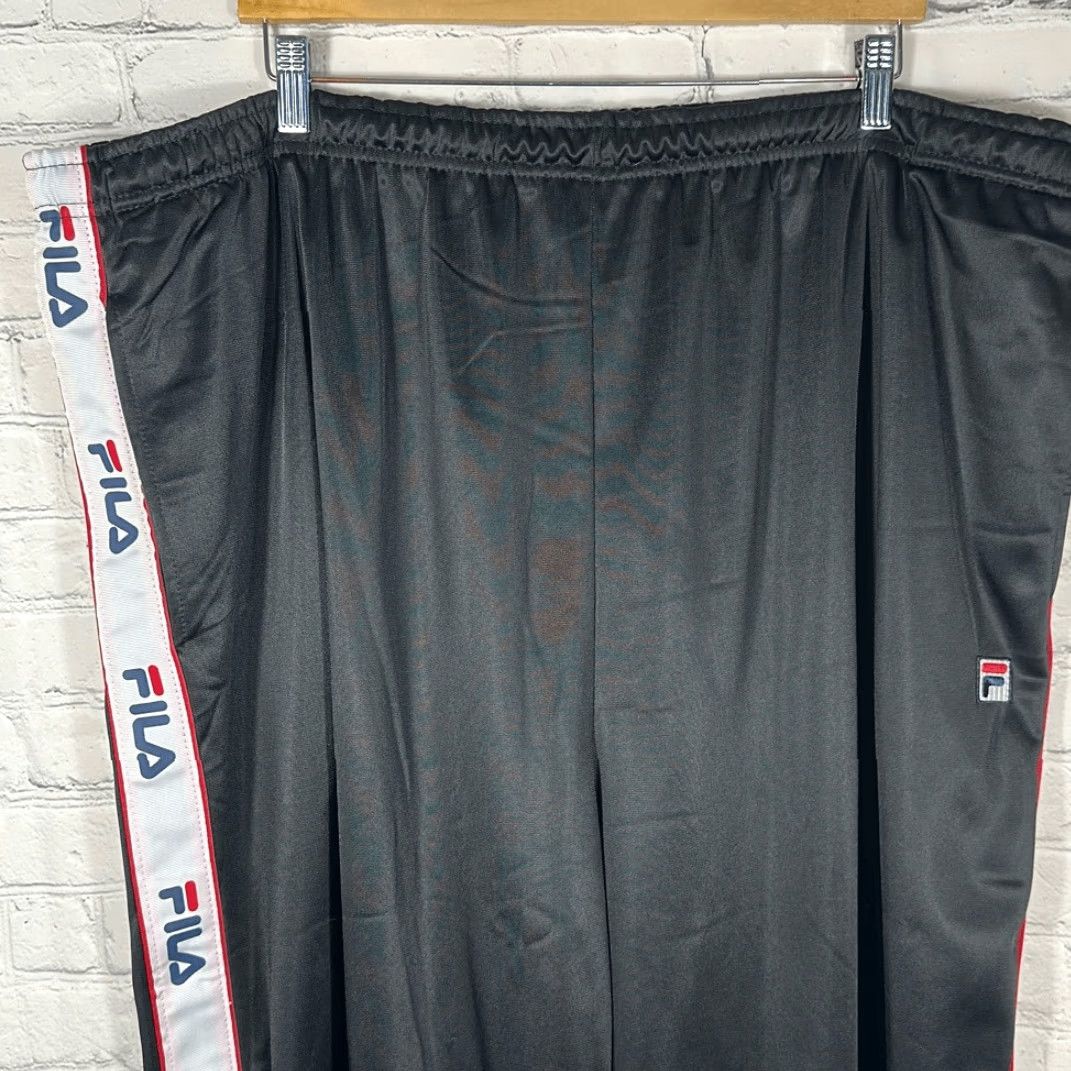 Fila VINTAGE Fila Track Pants Men’s 4XL Black Tapered Logo on Sides Polyester Track Pants Mens 4XL Black 90s Activewear Size US 39 - 5 Thumbnail