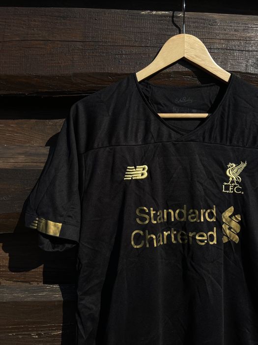 Liverpool black hot sale gold jersey