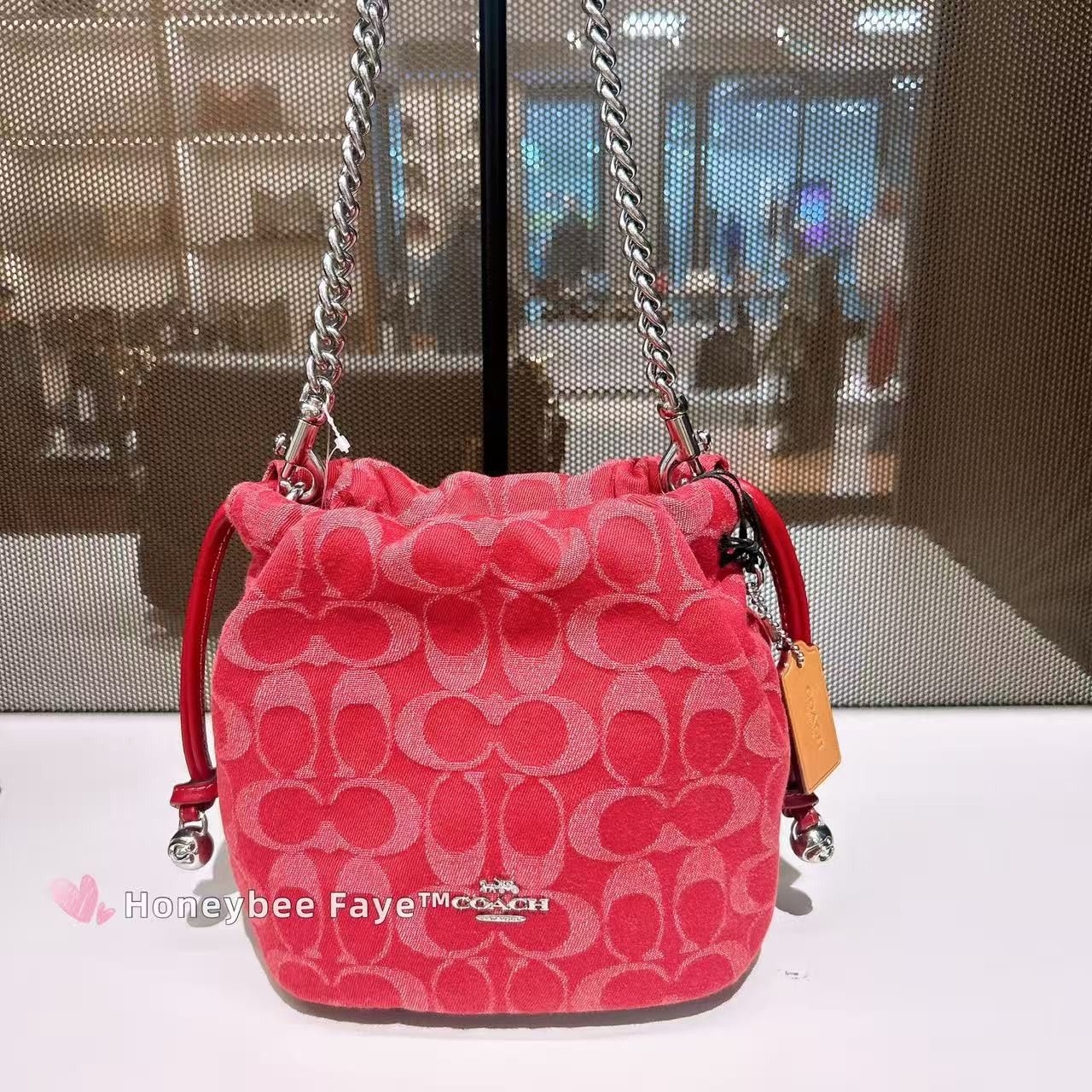 Faye Mini Drawstring Bag In Signature Denim CCZ45