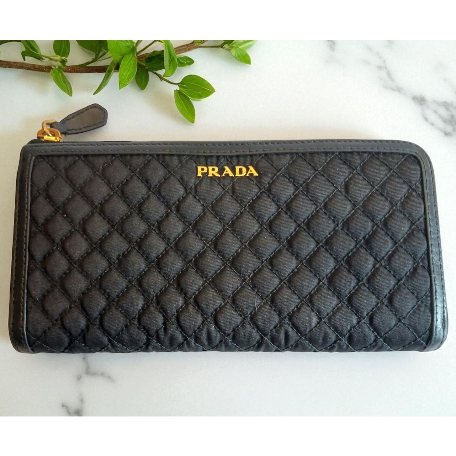 Prada Prada Tessuto Nylon Quilted Zip Around Wallet in Black Size ONE SIZE - 1 Thumbnail
