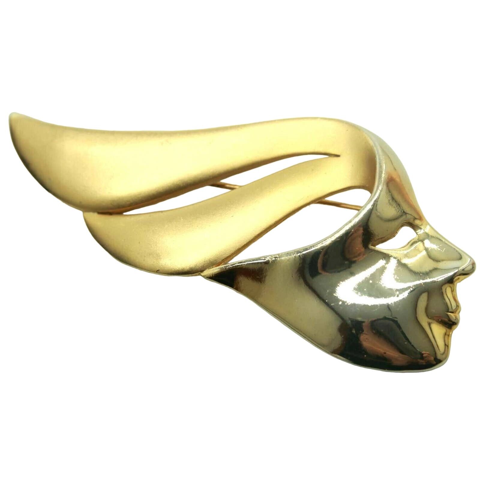 The Unbranded Brand Face Sweeping Hair Brushed Goldtone Mask Brooch Pin Size ONE SIZE - 1 Thumbnail