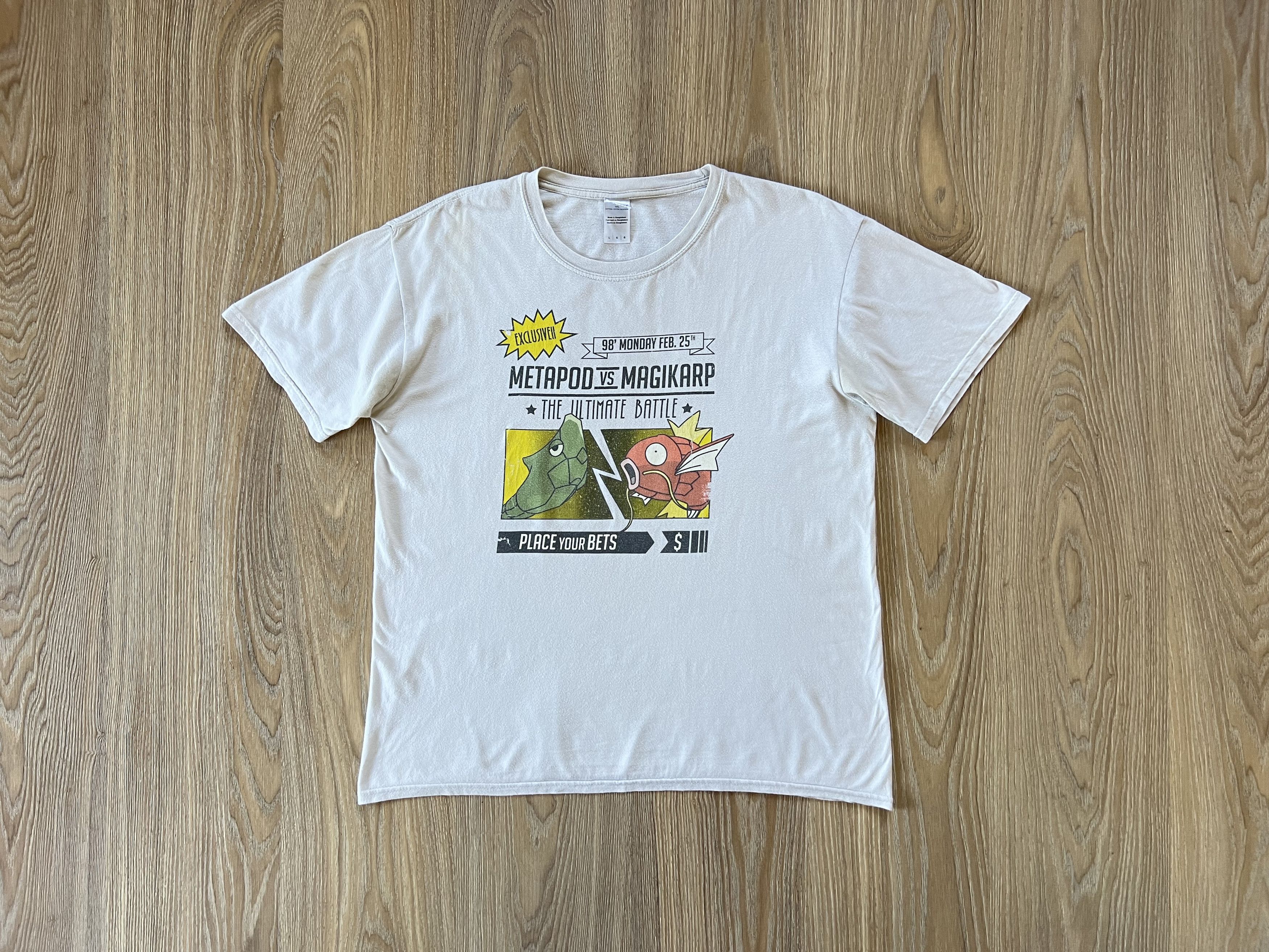 image of Nintendo x Pokemon Pokémon Metapod Vs Magikarp Vintage T Shirt in White, Men's (Size Large)