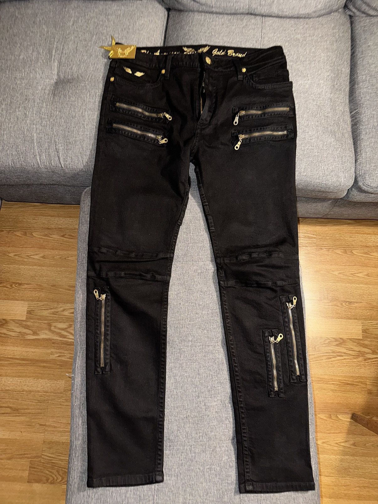 Black and gold biker jeans store