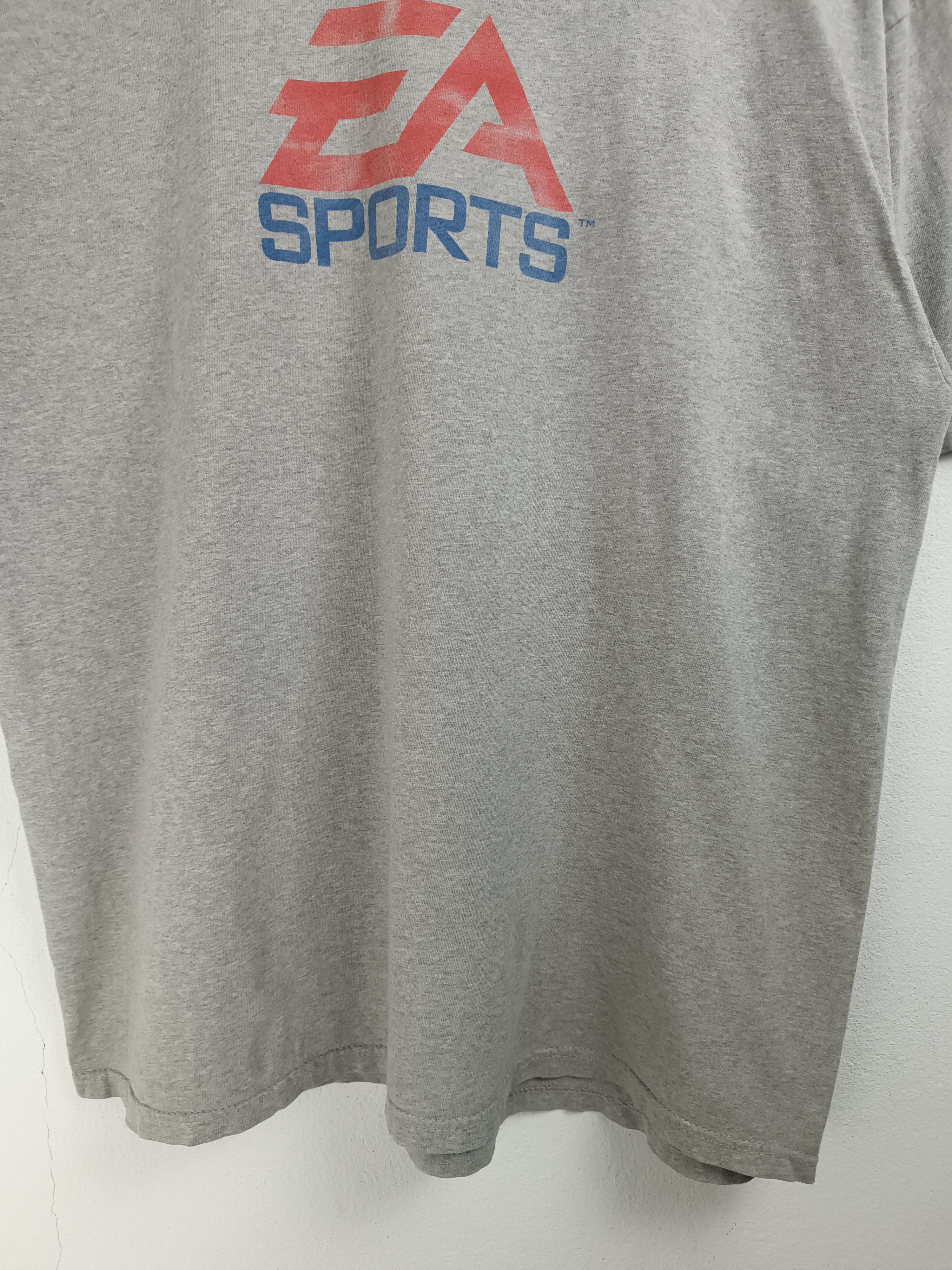 Champion VINTAGE Y2K EA SPORTS CHAMPION GAME FIFA 2K NBA VERY RARE Ts Size US XL / EU 56 / 4 - 9 Thumbnail