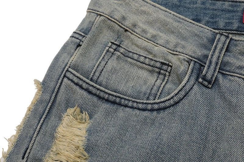 Ripped frayed hole blue washed baggy trousers jeans