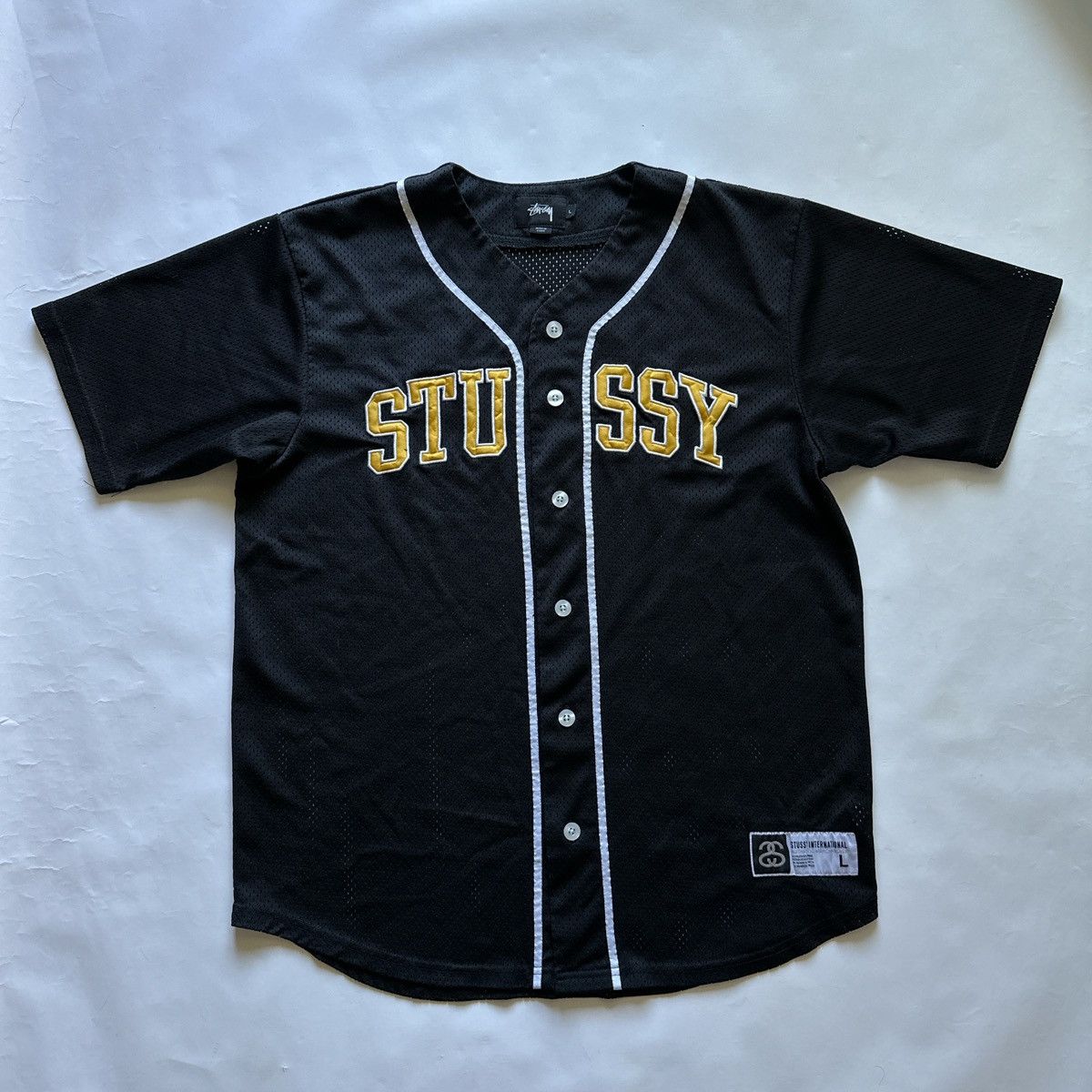 Stüssy: Men's Sport Mesh Football Jersey (Black) | DSMNY E-SHOP
