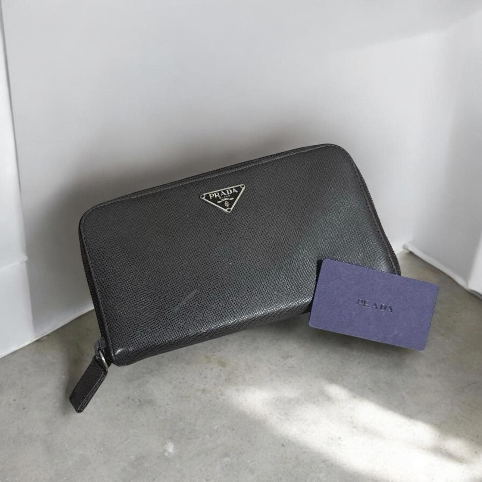 Prada Prada - Leather Zip Around Wallet in Black Size ONE SIZE - 1 Thumbnail