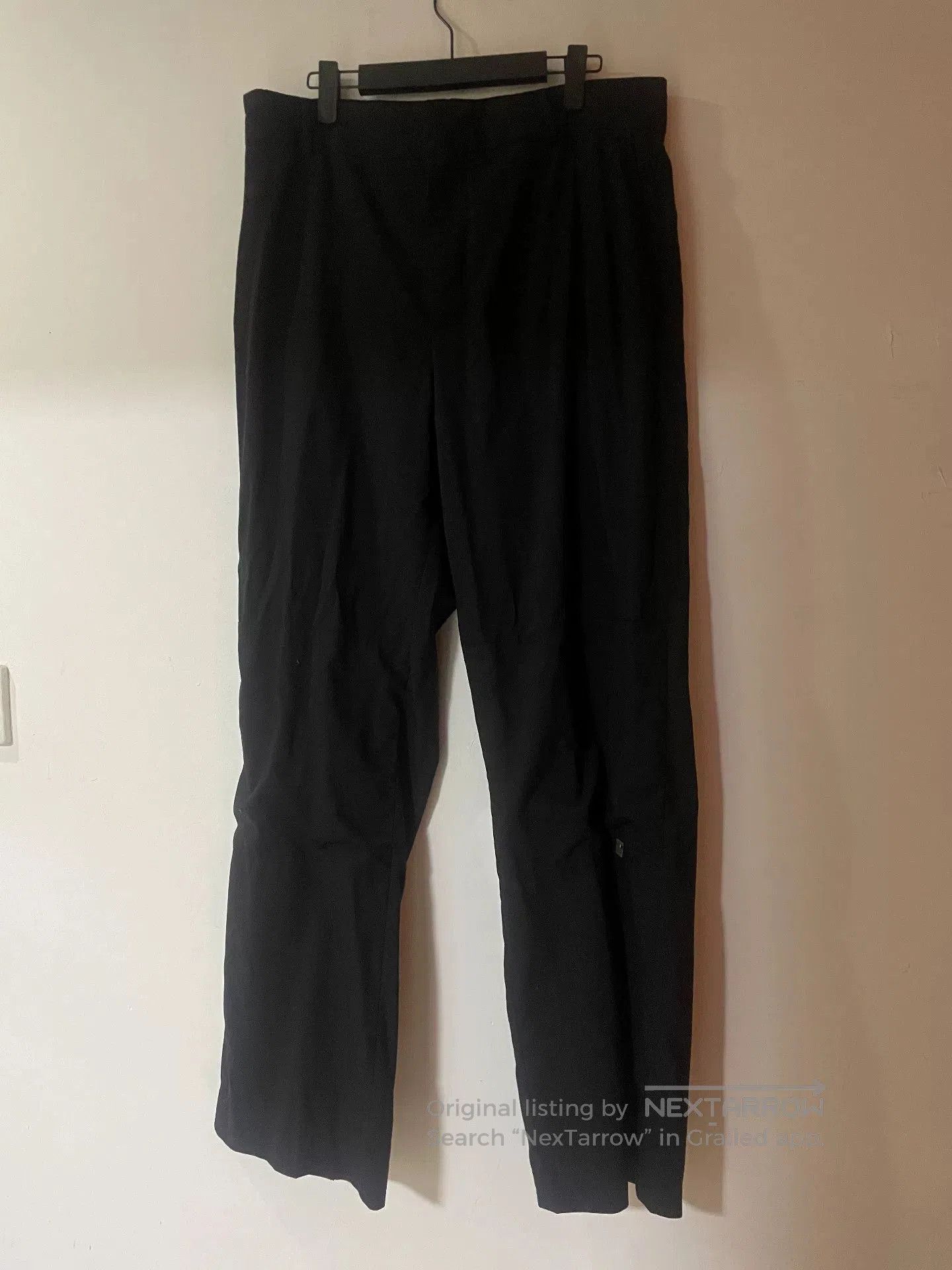 black wool straight-leg trousers size 48.