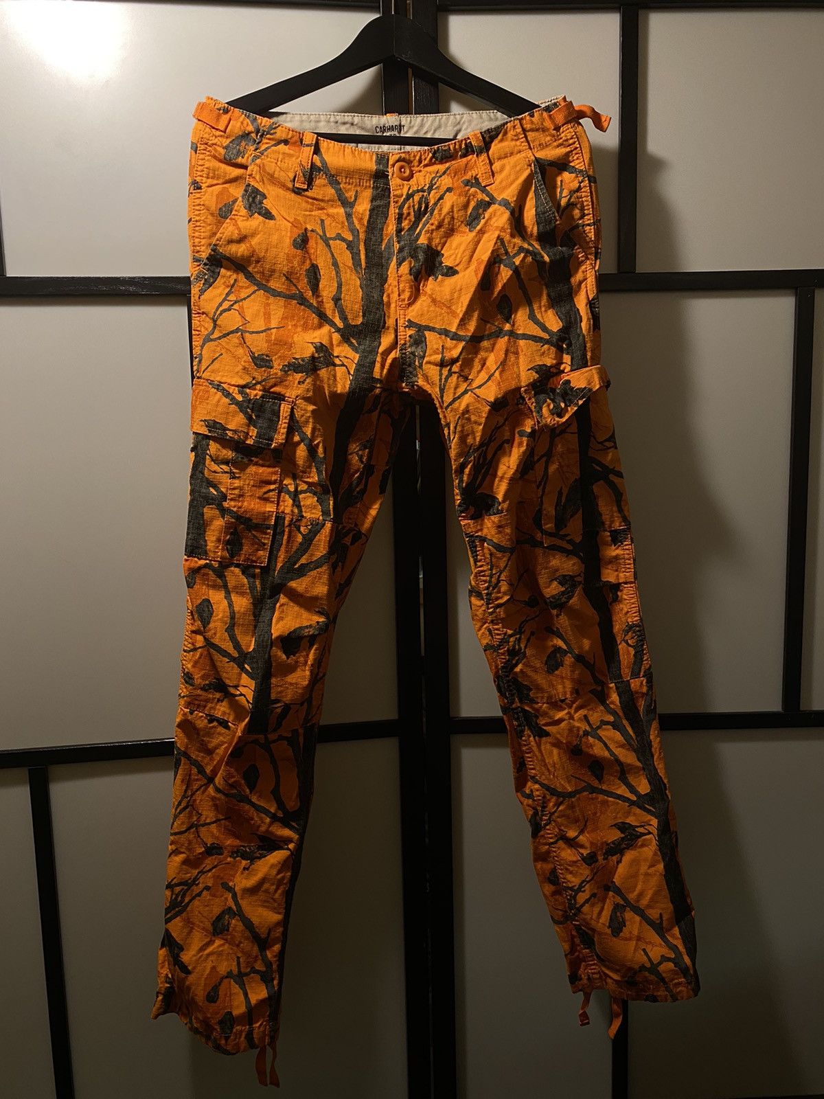 image of Carhartt Wip Aviation Orange Camo Pant in Orange Tree Camo, Men's (Size 30)