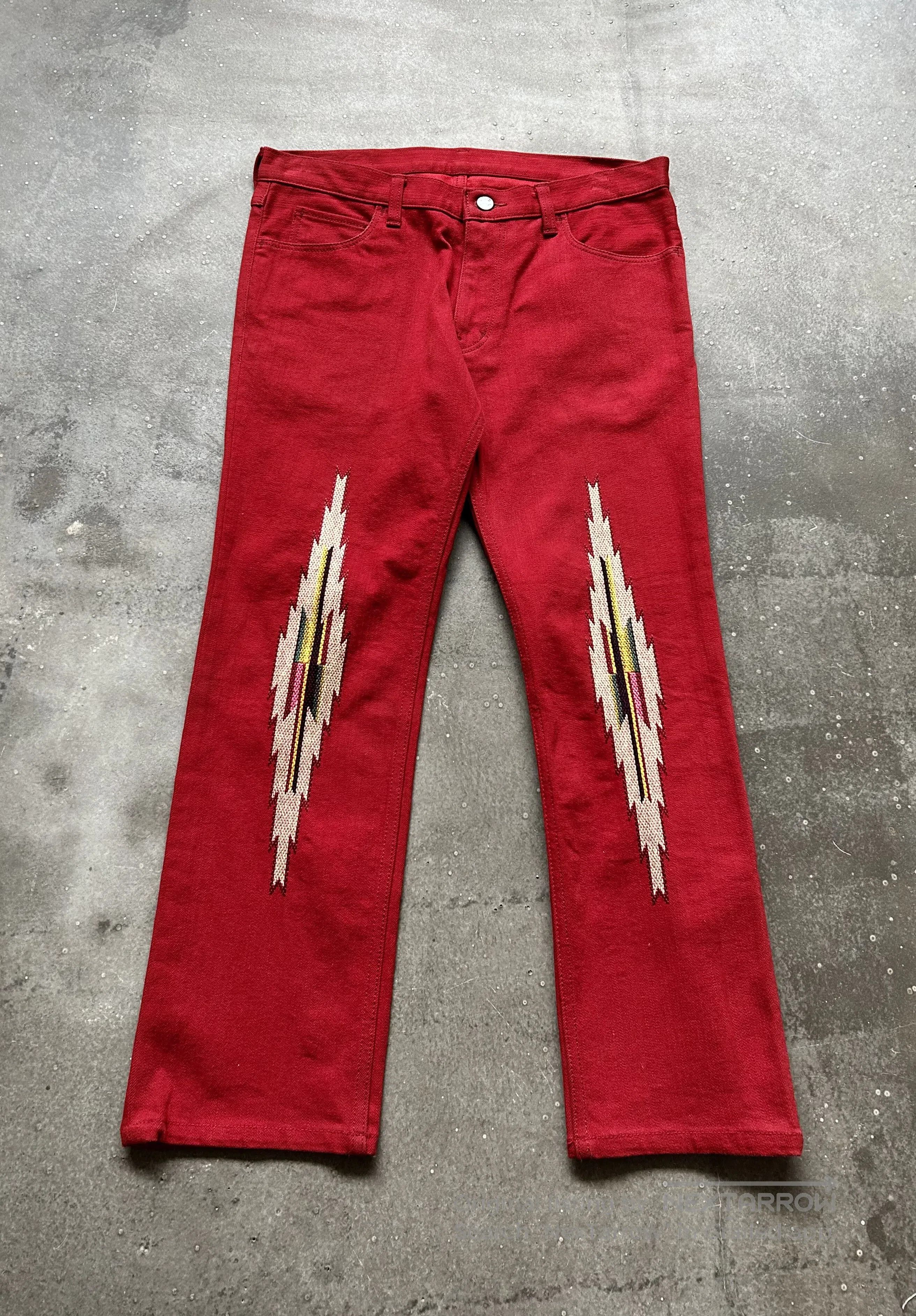 red jeans pants.