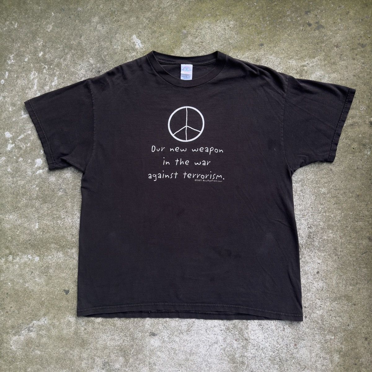 image of Vintage 2000S Our New Weapon Is The War Against Terroism Peace Tee in Black, Men's (Size XL)