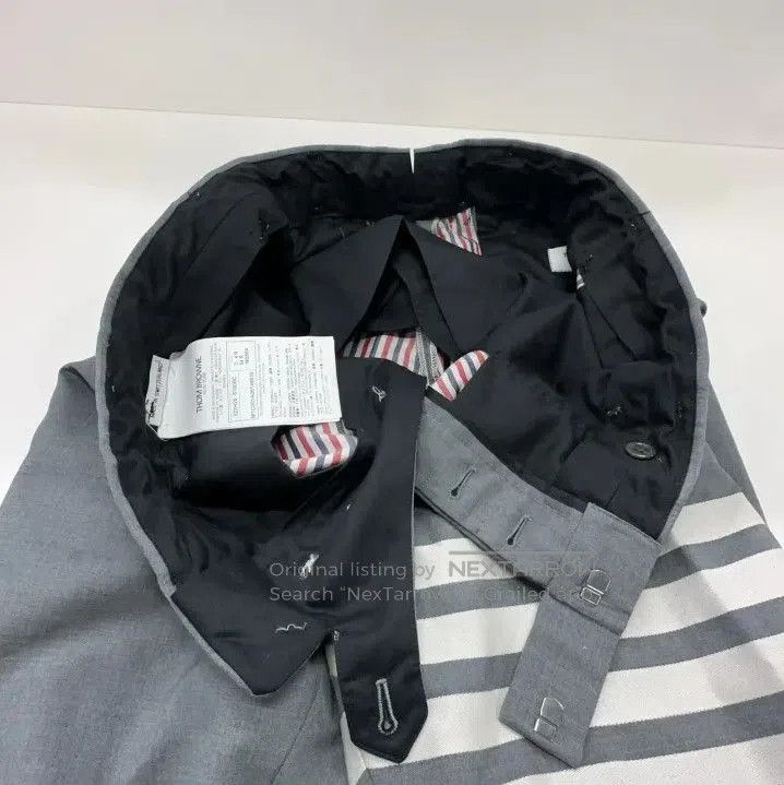 Thom Browne Navy Knit Sports Pants for Men.