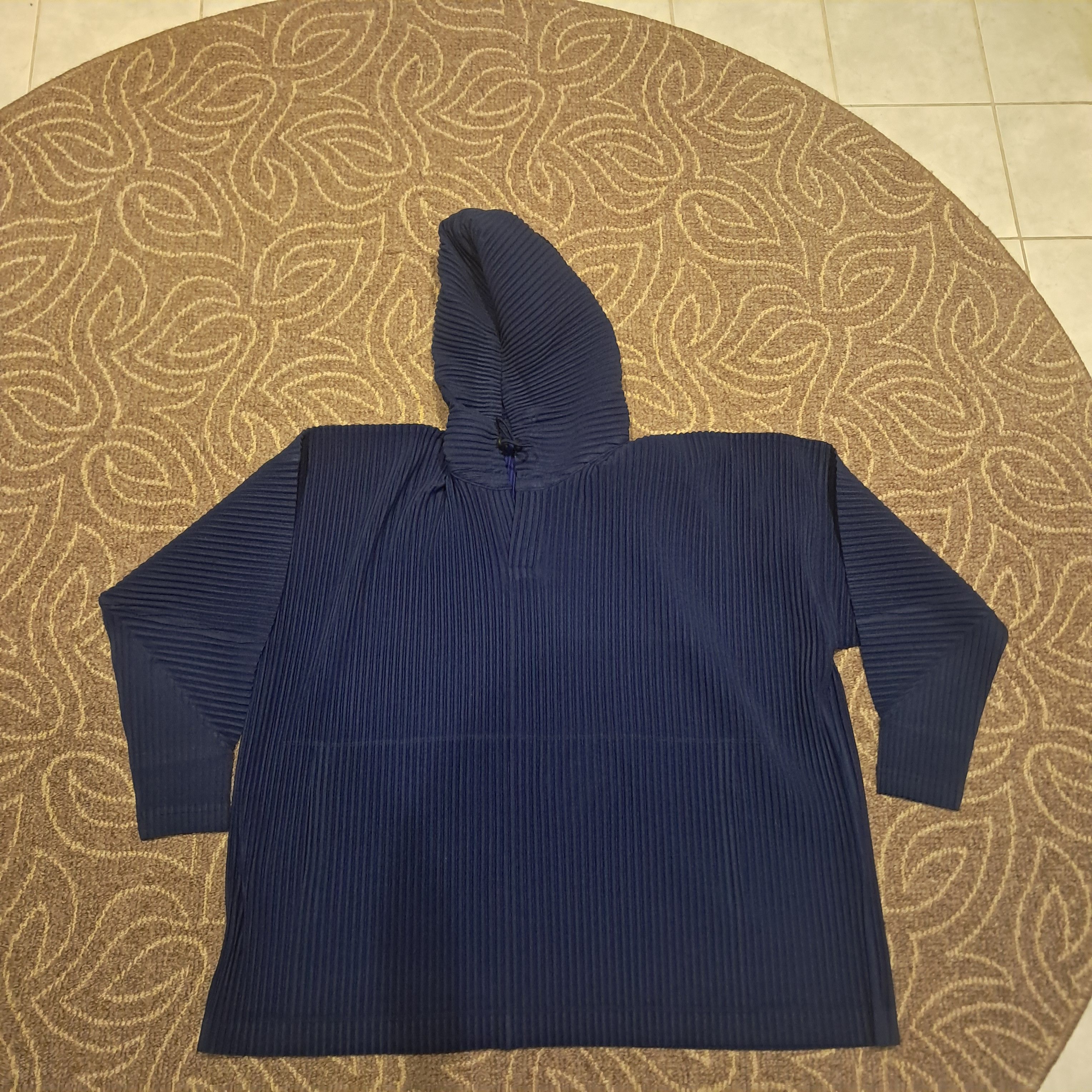 Blue pleated issey miyake hoodie