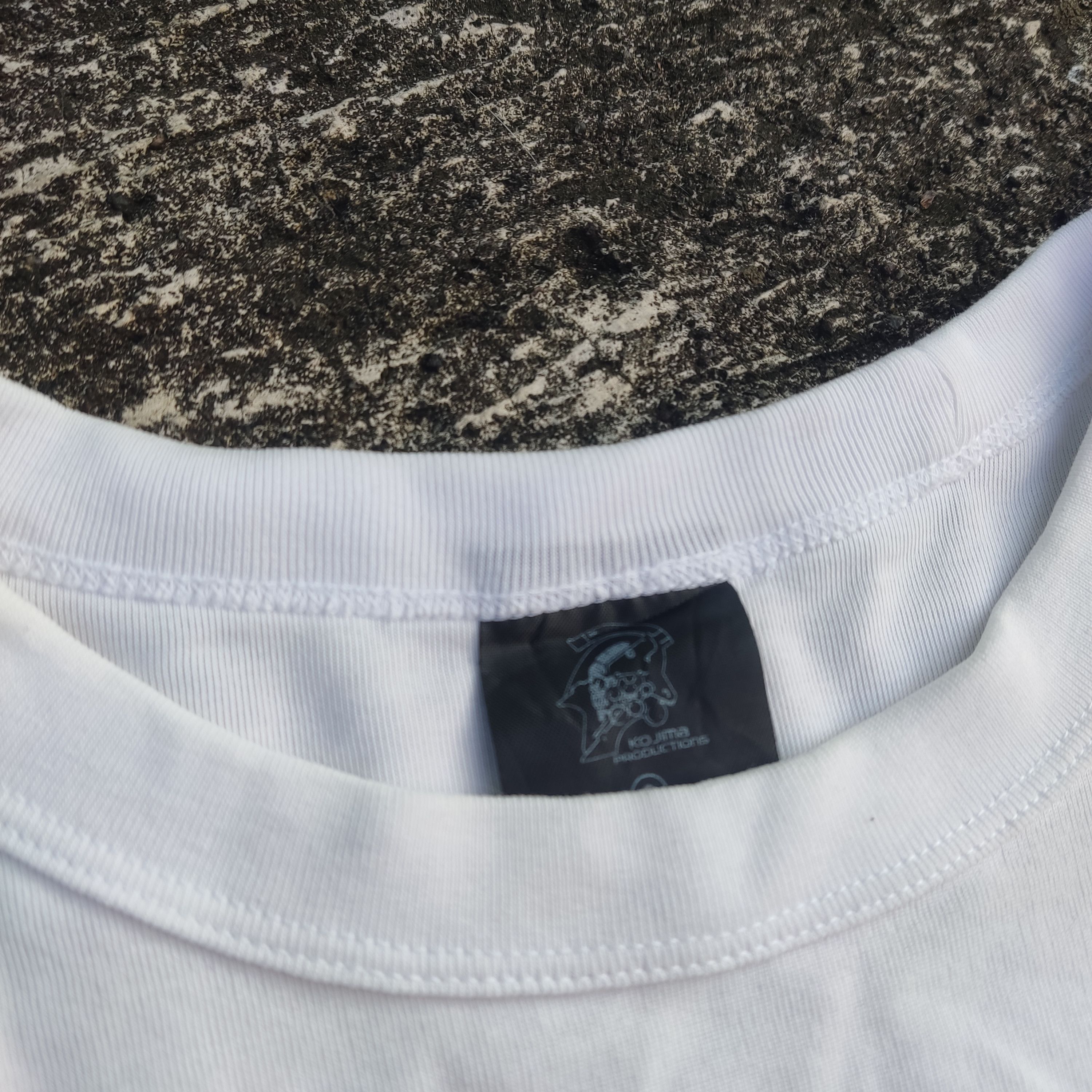 The Game Kojima x GU. Death Stranding, Kojima Production. Size US M / EU 48-50 / 2 - 4 Thumbnail
