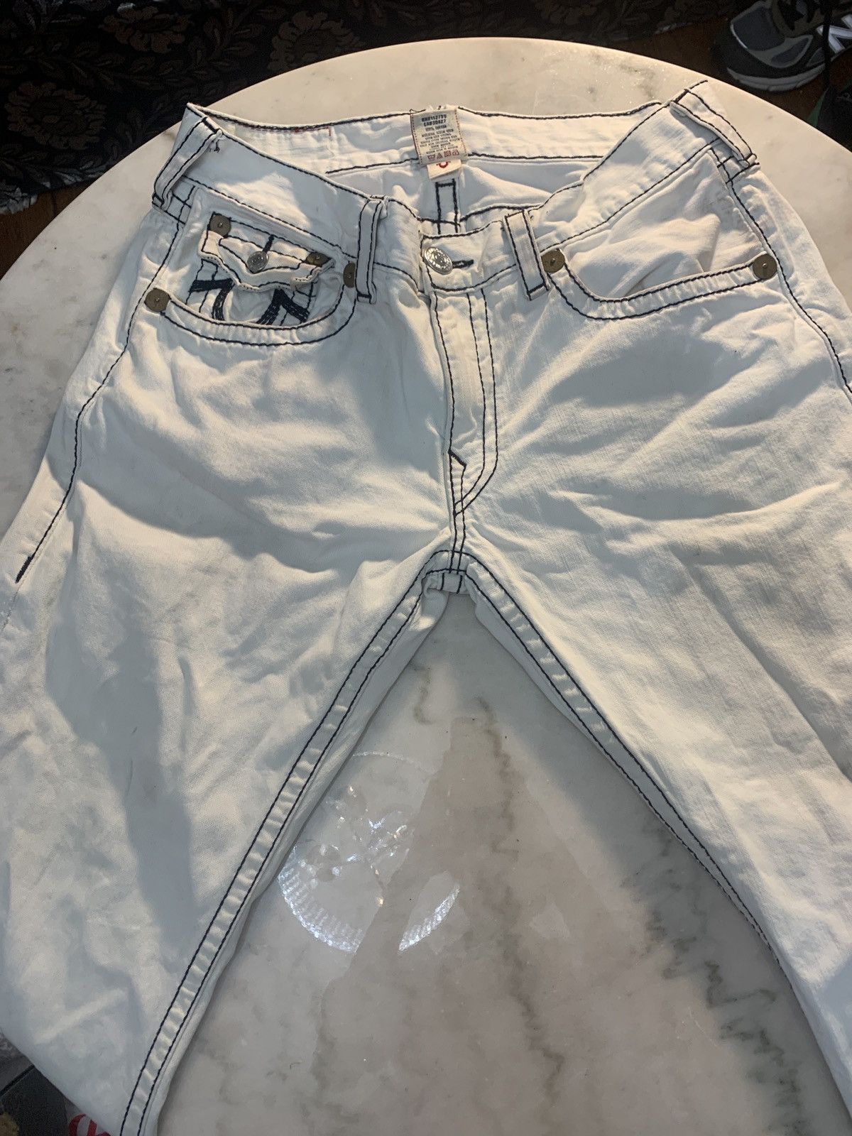 White True Religion jeans with Black stitching