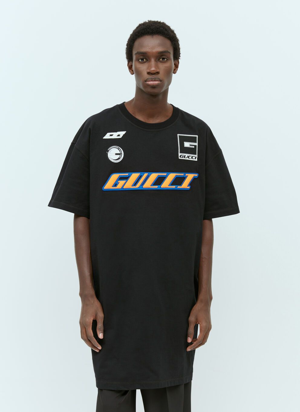 image of Gucci Logo Emblems T-Shirt in Black, Men's (Size Small)