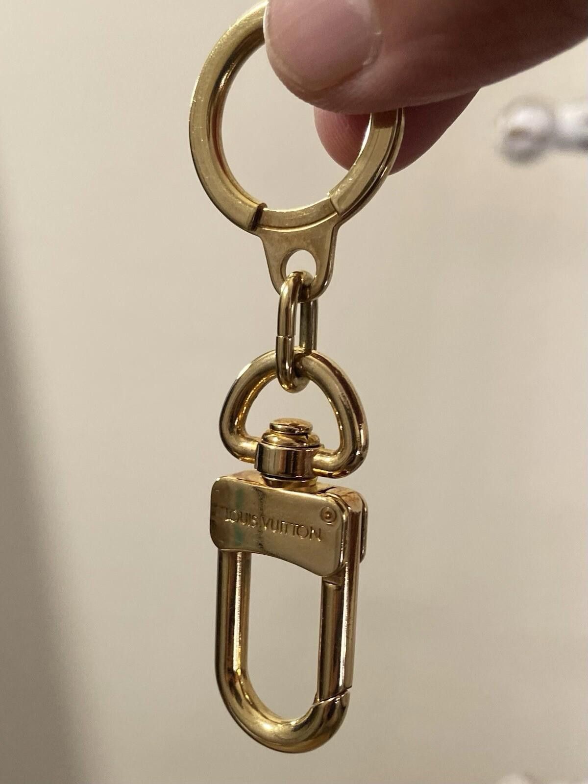 Louis Vuitton Louis Vuitton gold metal keychain bag charm, made in France Size ONE SIZE - 1 Thumbnail