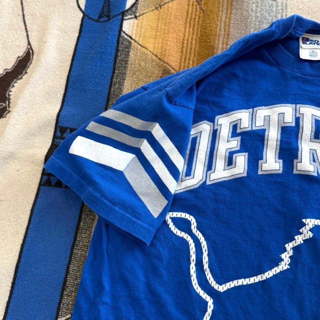 Pro Player VINTAGE Detroit Lions Pro Player Double Sided T-Shirt Size XL Men Short Sleeve Blue 90s NFL Football Lions ProPlayer Regular fit United States Size US XL / EU 56 / 4 - 7 Thumbnail