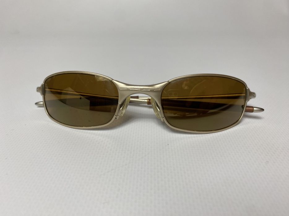 Vintage oakley metal frame sunglasses sales