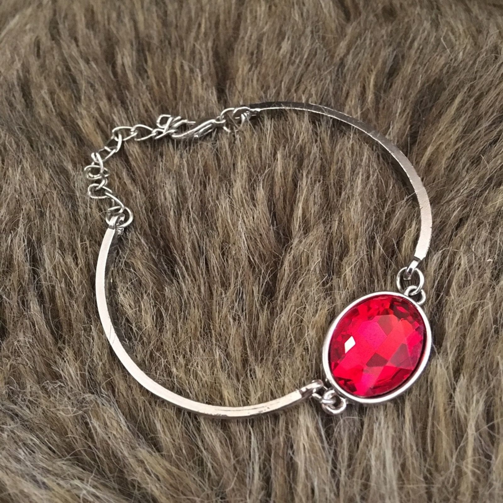 Jewelry Silver tone faceted oval cut faux ruby bracelet Size ONE SIZE - 5 Thumbnail
