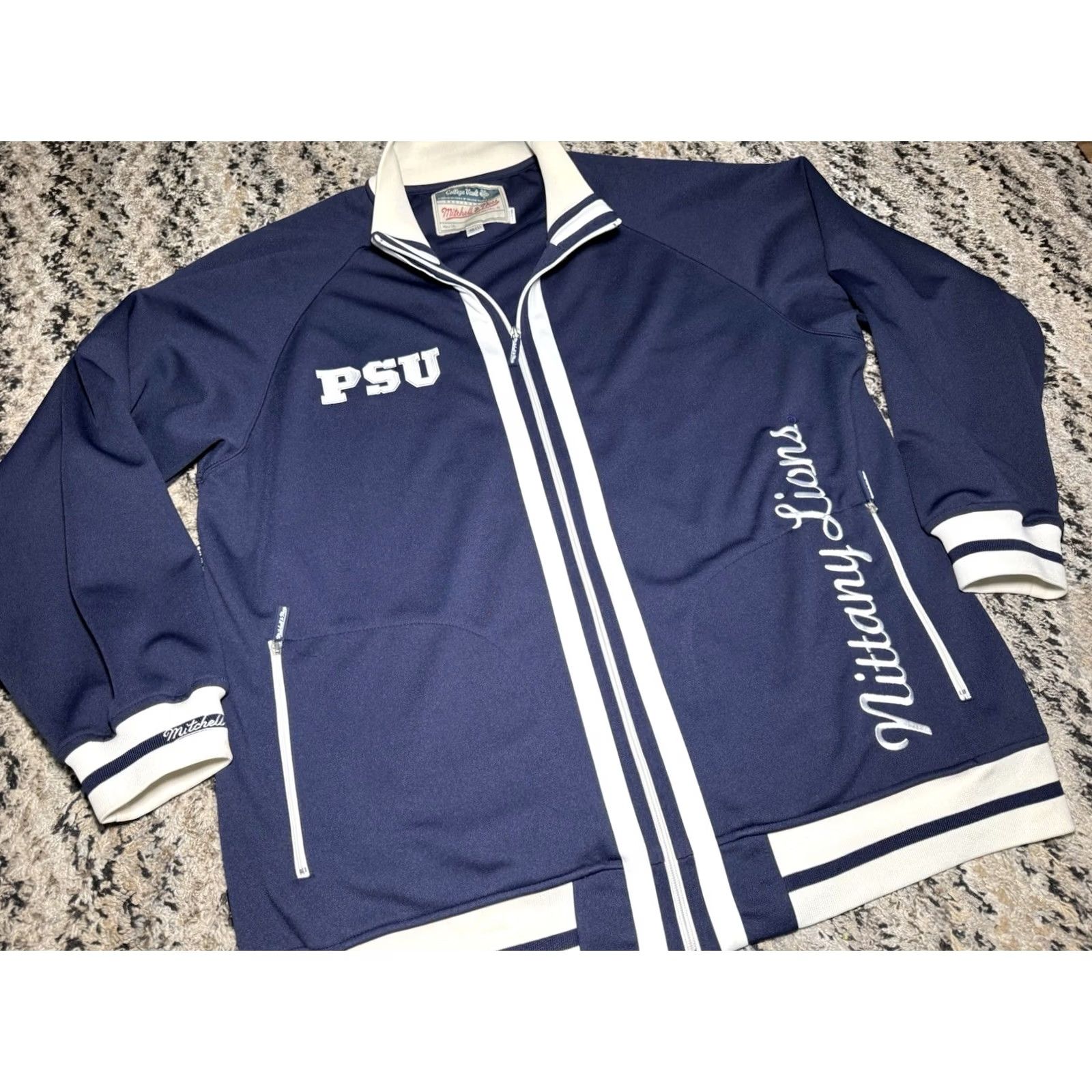 Mitchell & Ness Mitchell & Ness Track Jacket Penn State Nittany Lions PSU Blue XL Zip Up Collage Vault Men Sports Gym & Training 27in Wide 30in Long Zipped Pockets Size US XL / EU 56 / 4 - 2 Thumbnail